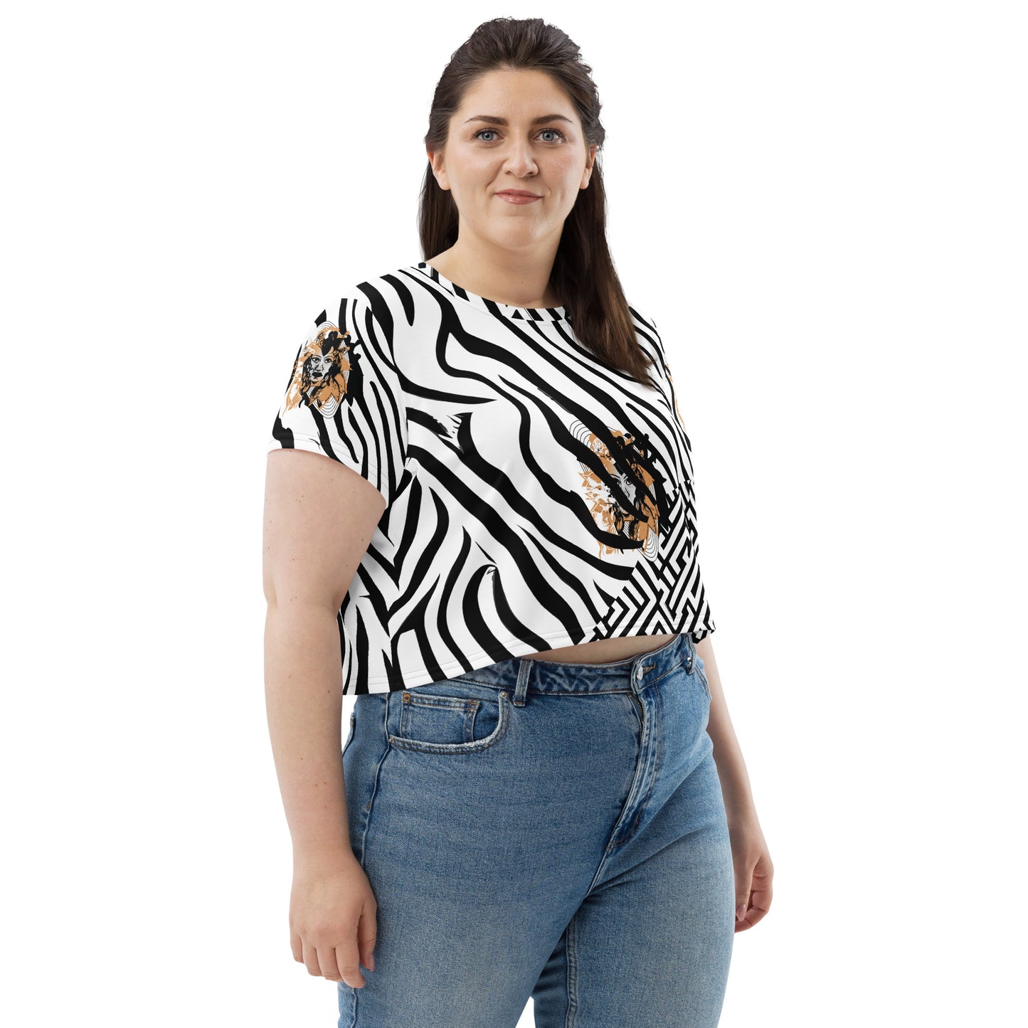 Plus size model wearing black and white zebra print crop tee from Kloe Store featuring a bold artistic face design in the center, showcasing unique and edgy streetwear fashion.