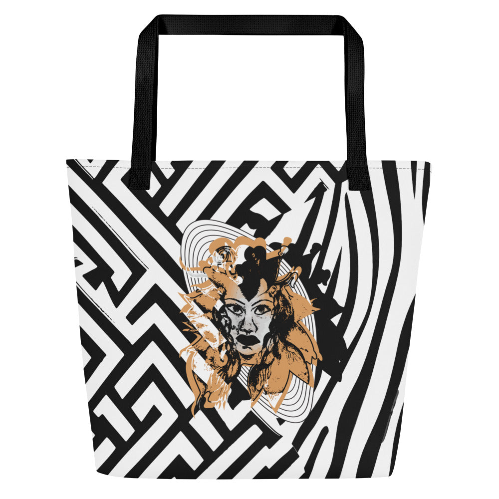 Large black and white tote bag from Kloe Store featuring bold geometric and zebra patterns with an artistic face design and with black straps, stylish and functional for everyday use.