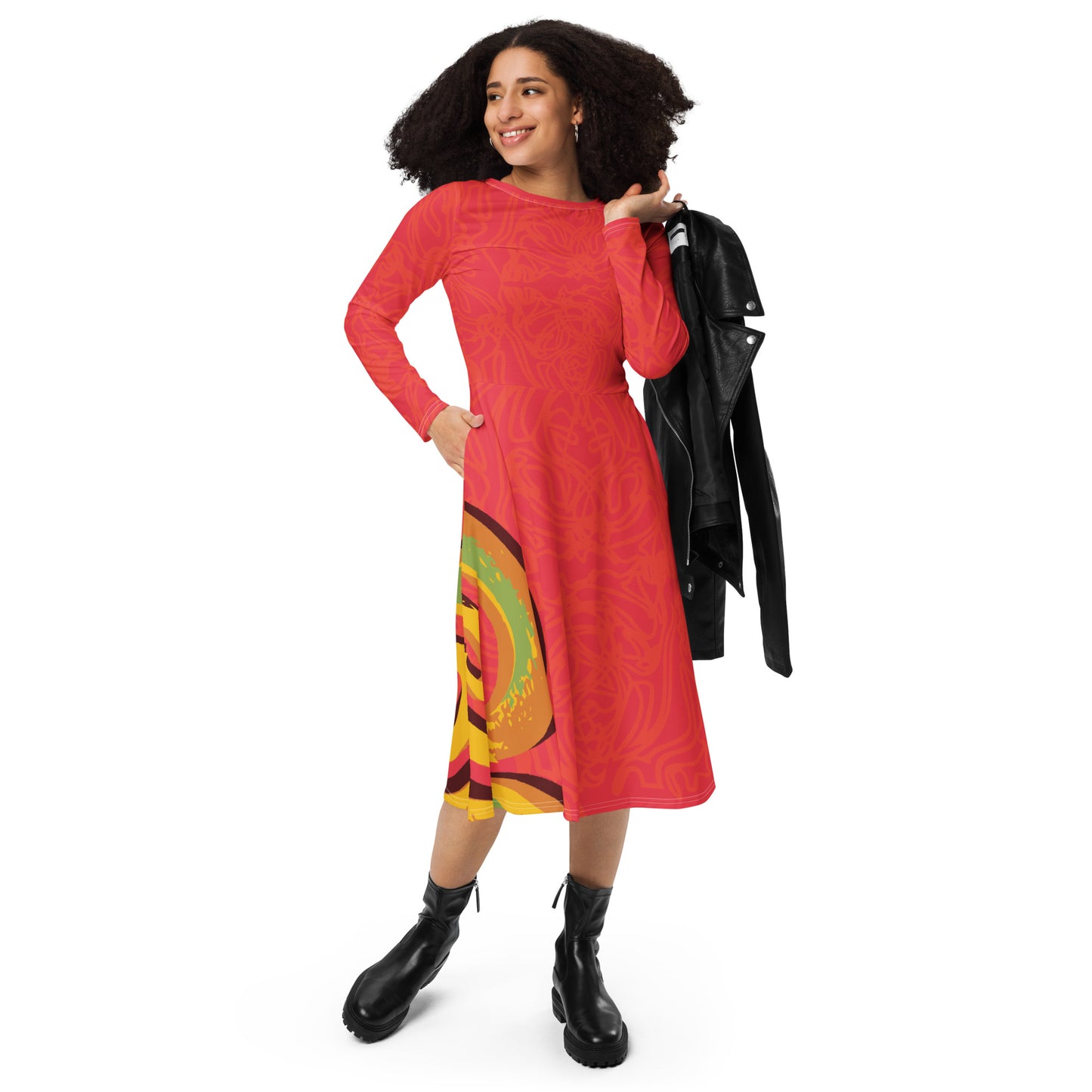 Red dress with vibrant swirl details and mirrored face design on the back, inspired by cultural art and bold self-expression.