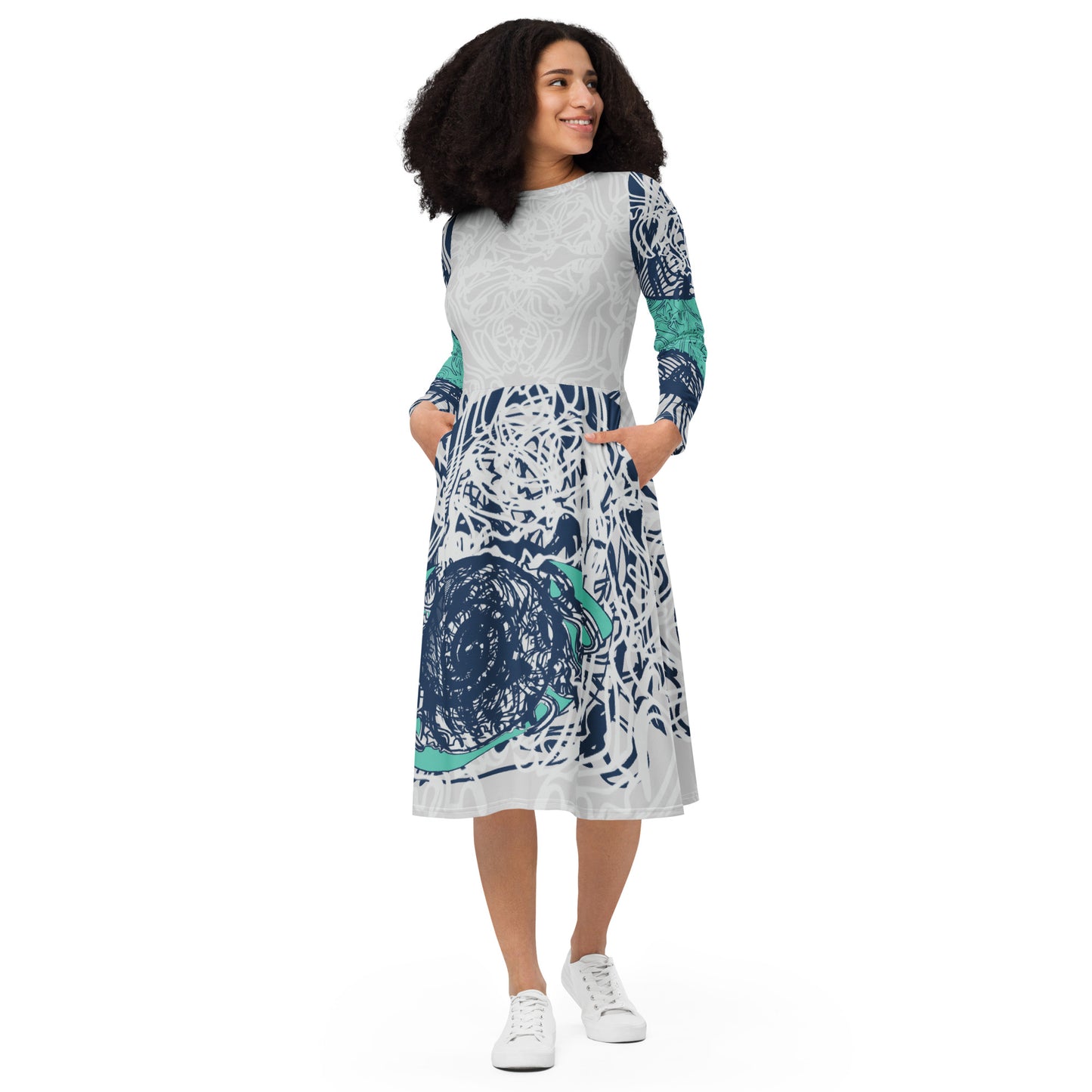Long sleeve midi dress with full-body abstract print in navy and jade, featuring hand-drawn mirrored faces and layered spiral motifs—designed to express standout individuality.
