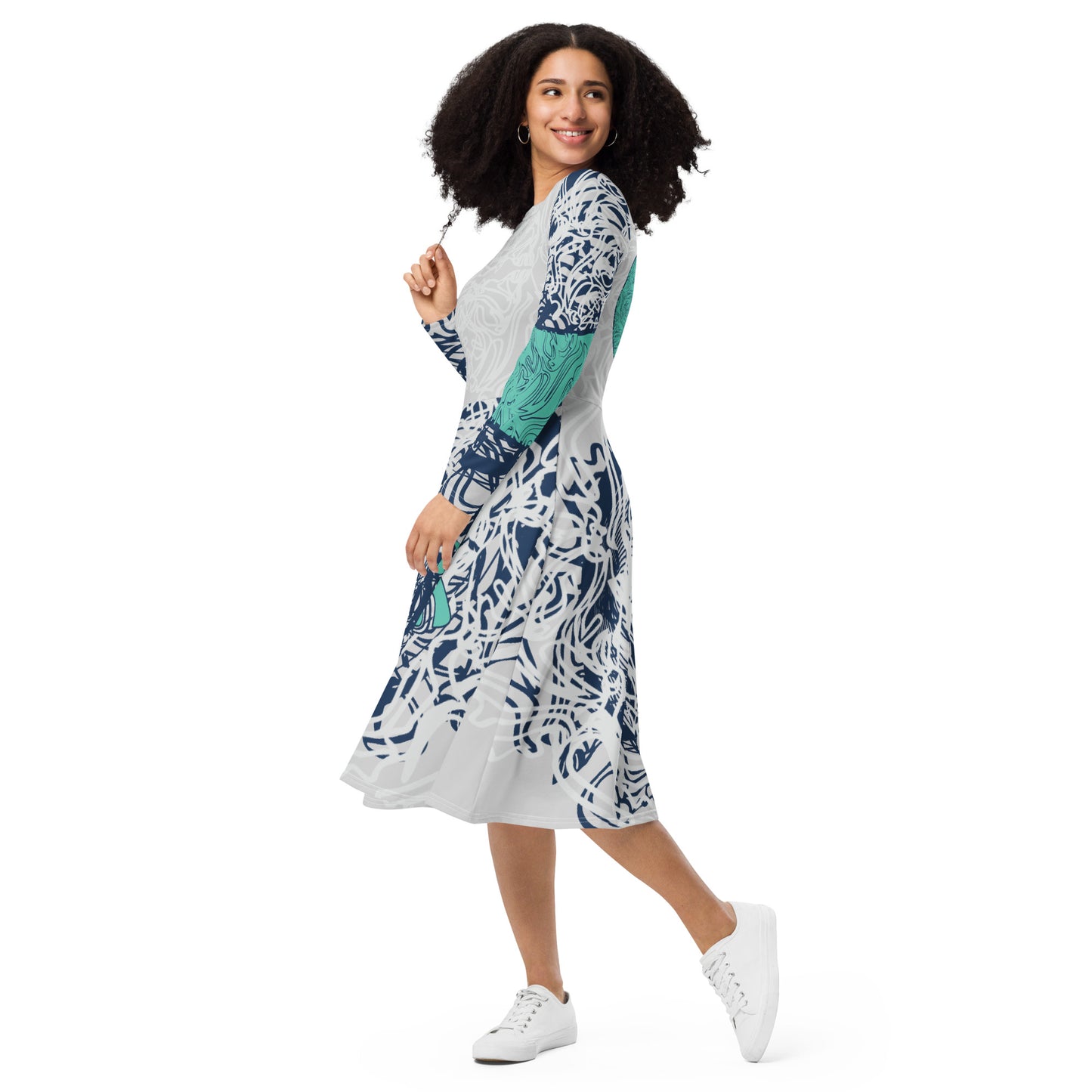 Long sleeve midi dress with full-body abstract print in navy and jade, featuring hand-drawn mirrored faces and layered spiral motifs—designed to express standout individuality.