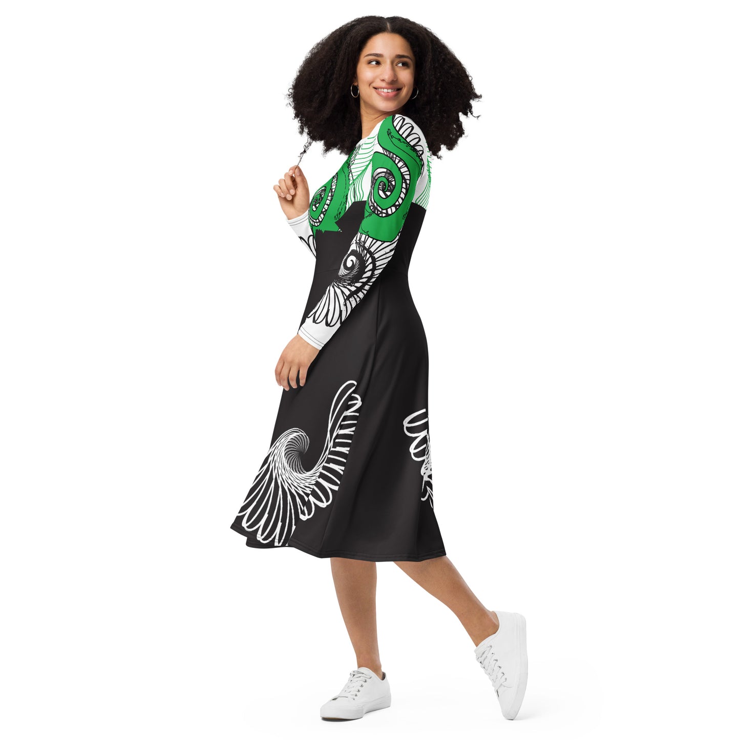 Hand-illustrated long-sleeve midi dress featuring bold green spirals, a drawing of two mirrored faces, and dynamic wing-inspired linework — designed for authentic self-expression and rooted in global artistic influence, exclusive to KLOE.