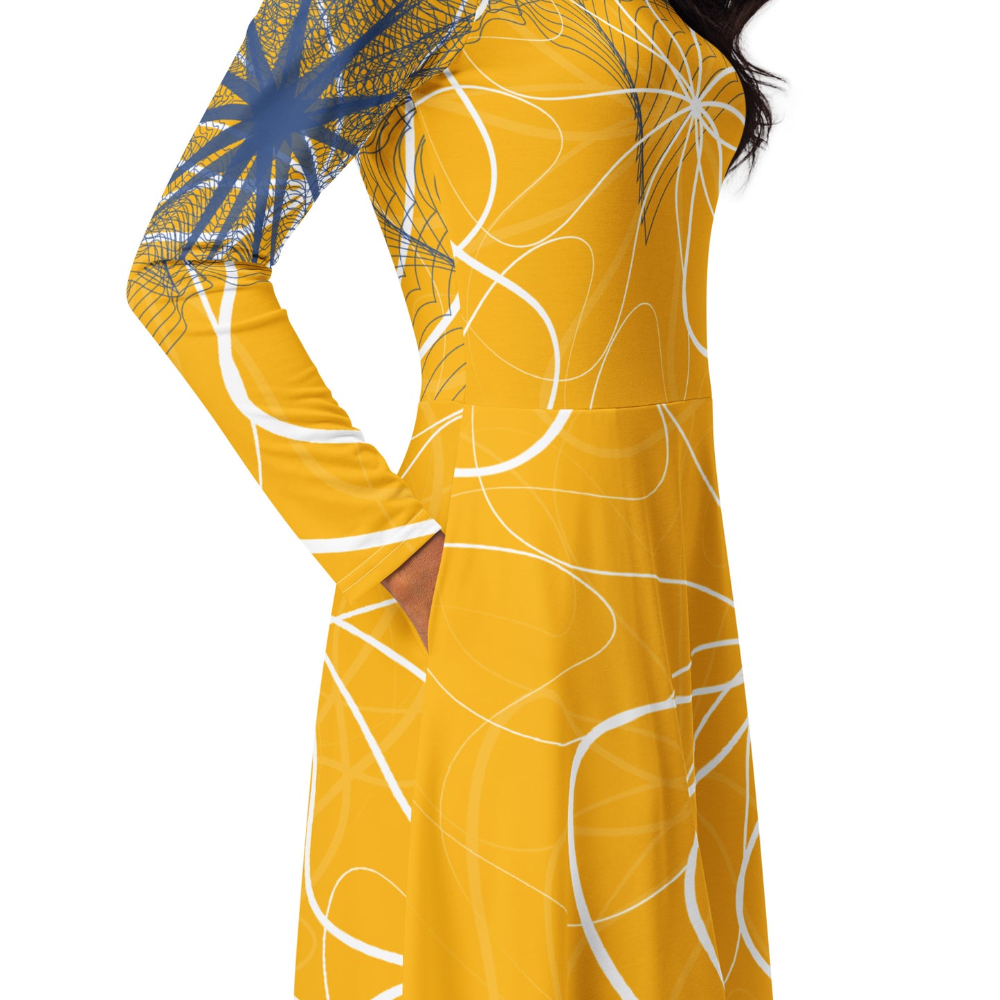 Front view of a golden yellow long sleeve midi dress featuring white swirling line art and navy geometric accents, blending flowing streetwear design with expressive hand-drawn patterns.