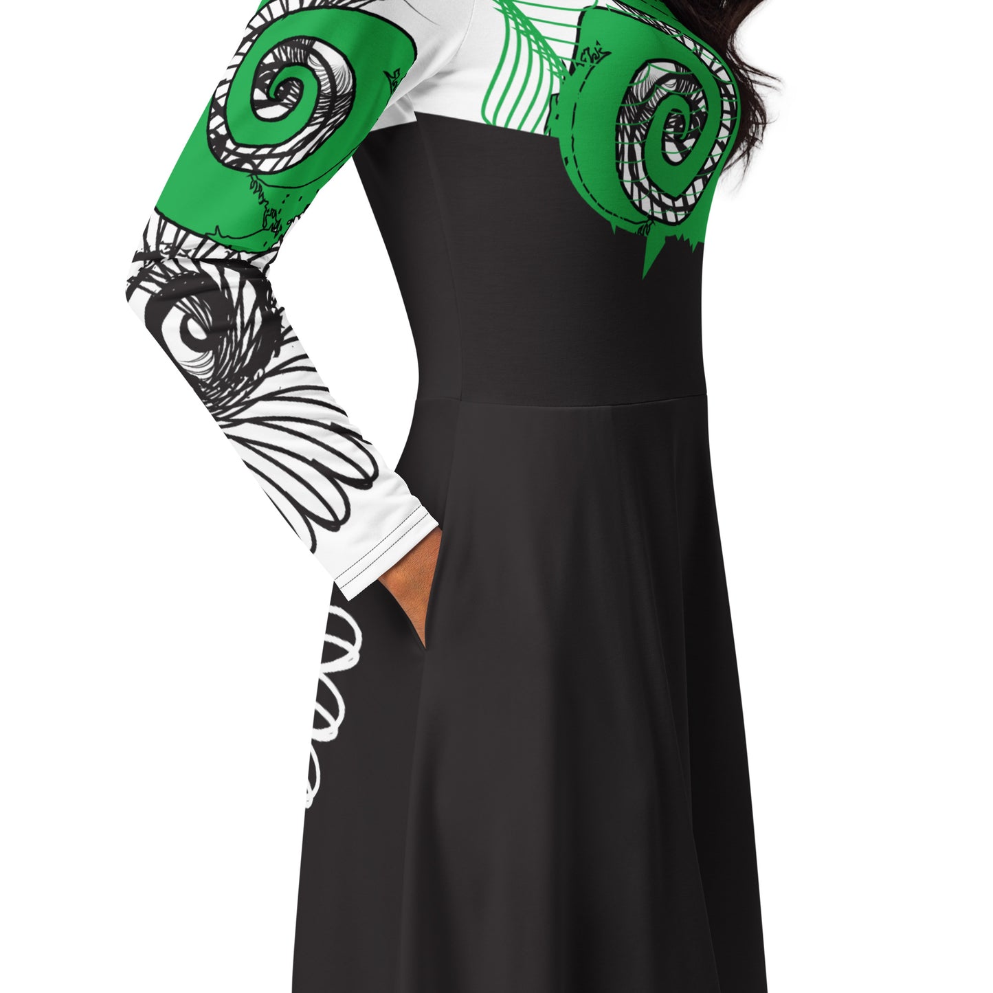 Hand-illustrated long-sleeve midi dress featuring bold green spirals, a drawing of two mirrored faces, and dynamic wing-inspired linework — designed for authentic self-expression and rooted in global artistic influence, exclusive to KLOE.