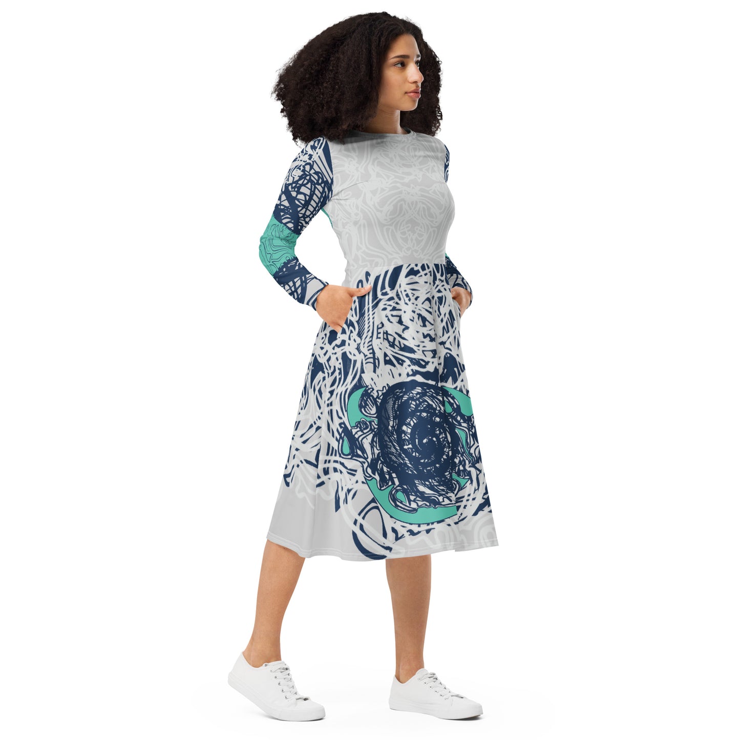 Long sleeve midi dress with full-body abstract print in navy and jade, featuring hand-drawn mirrored faces and layered spiral motifs—designed to express standout individuality.