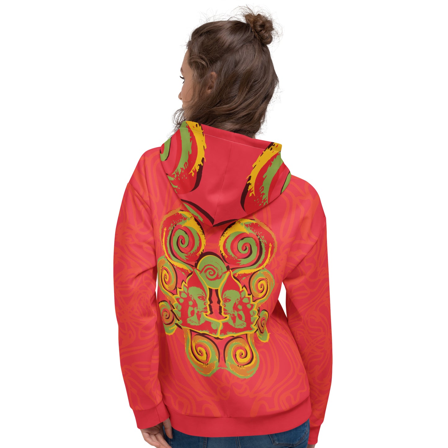 Red hoodie with bold spiral pocket design and mirrored face artwork on the back, inspired by cultural art and self-expression.