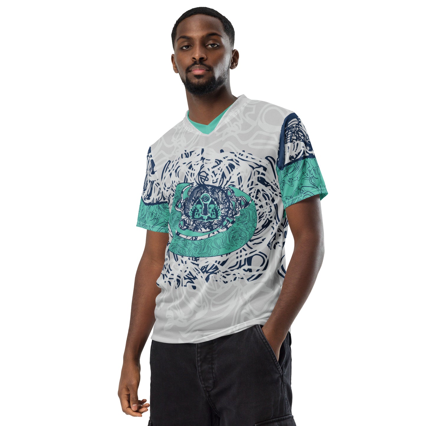 All-over print recycled unisex sports jersey featuring hand-drawn, culturally inspired artwork in navy and jade tones—celebrating individuality and artistic expression through intricate, abstract symbolism. Made by KLOE.