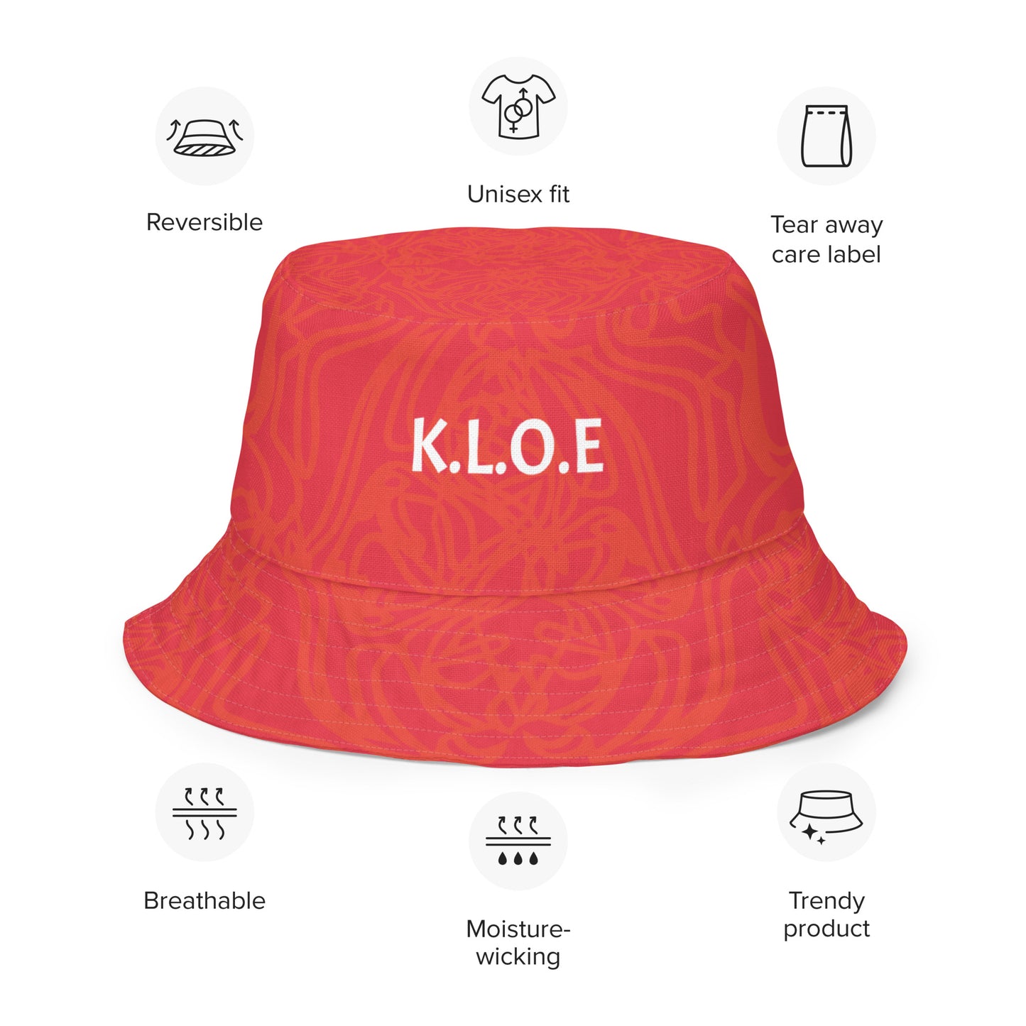 Reversible red-orange bucket hat with cultural swirl design and mirrored face motif on one side, and K.L.O.E wordmark on the other.