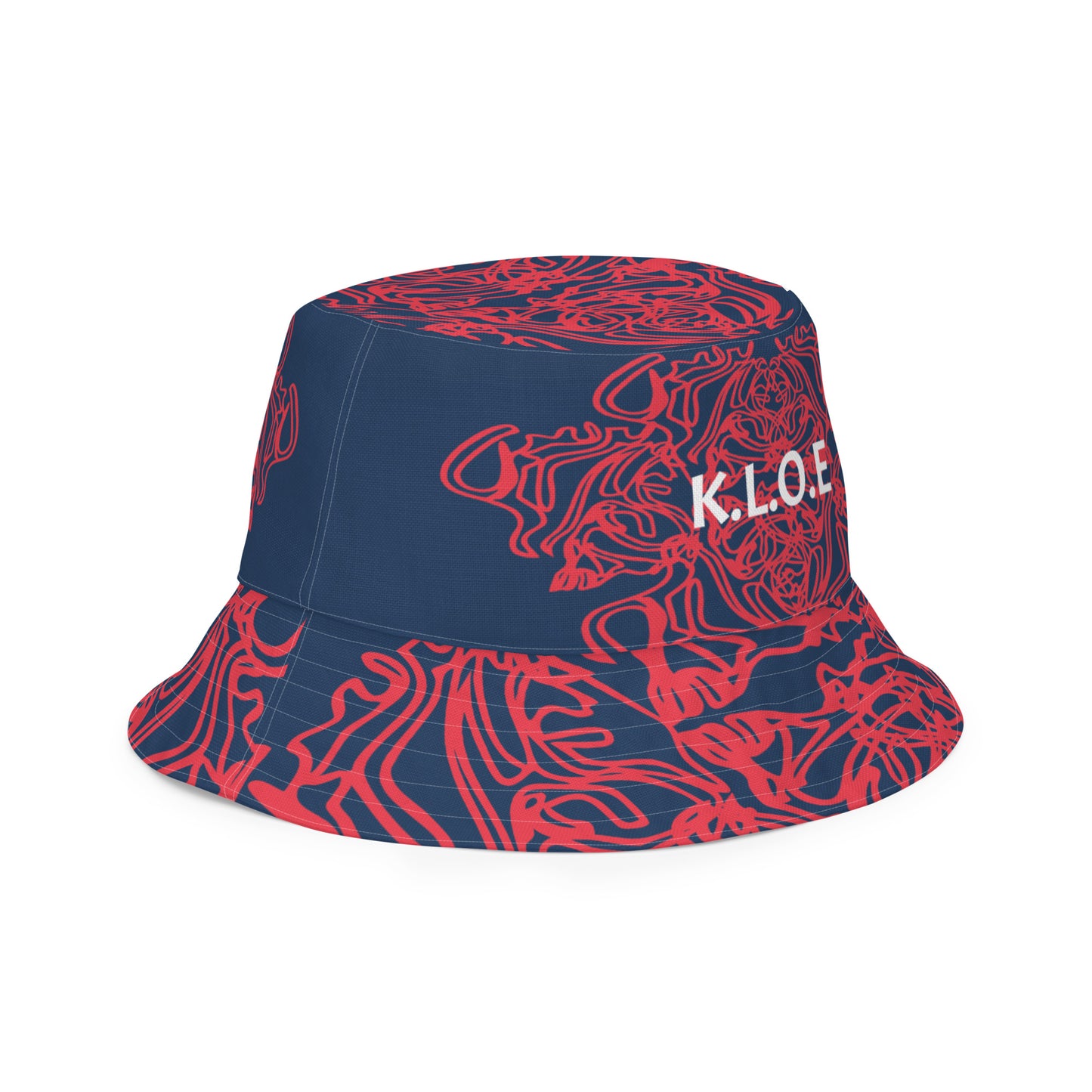 Bold reversible streetwear bucket hat featuring hand-drawn tribal patterns on one side and a mirrored face design on the other, crafted in navy and red for an edgy, modern look – KLOE fashion.