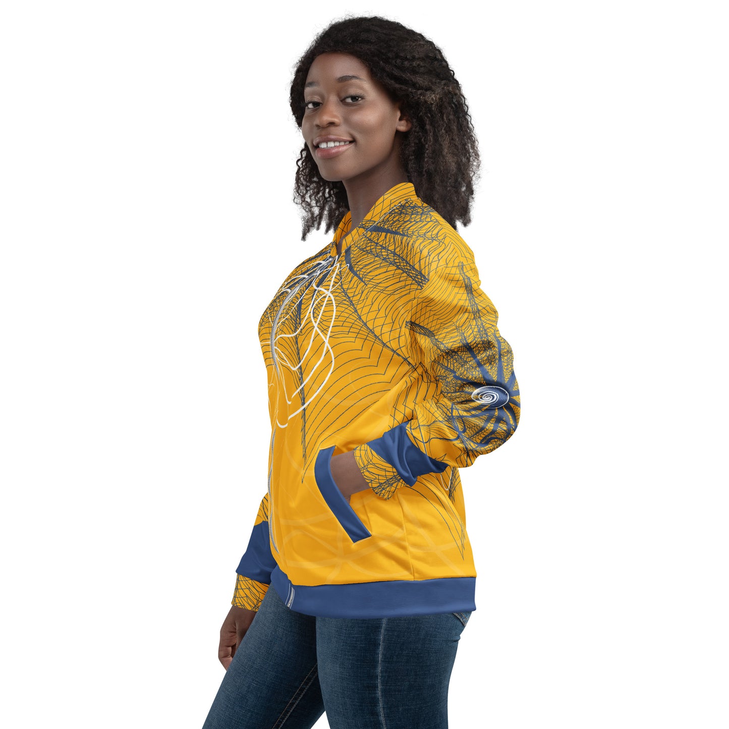 Side view of a golden yellow bomber jacket featuring navy geometric linework and flowing white abstract patterns, blending streetwear style with hand-drawn artistic energy.