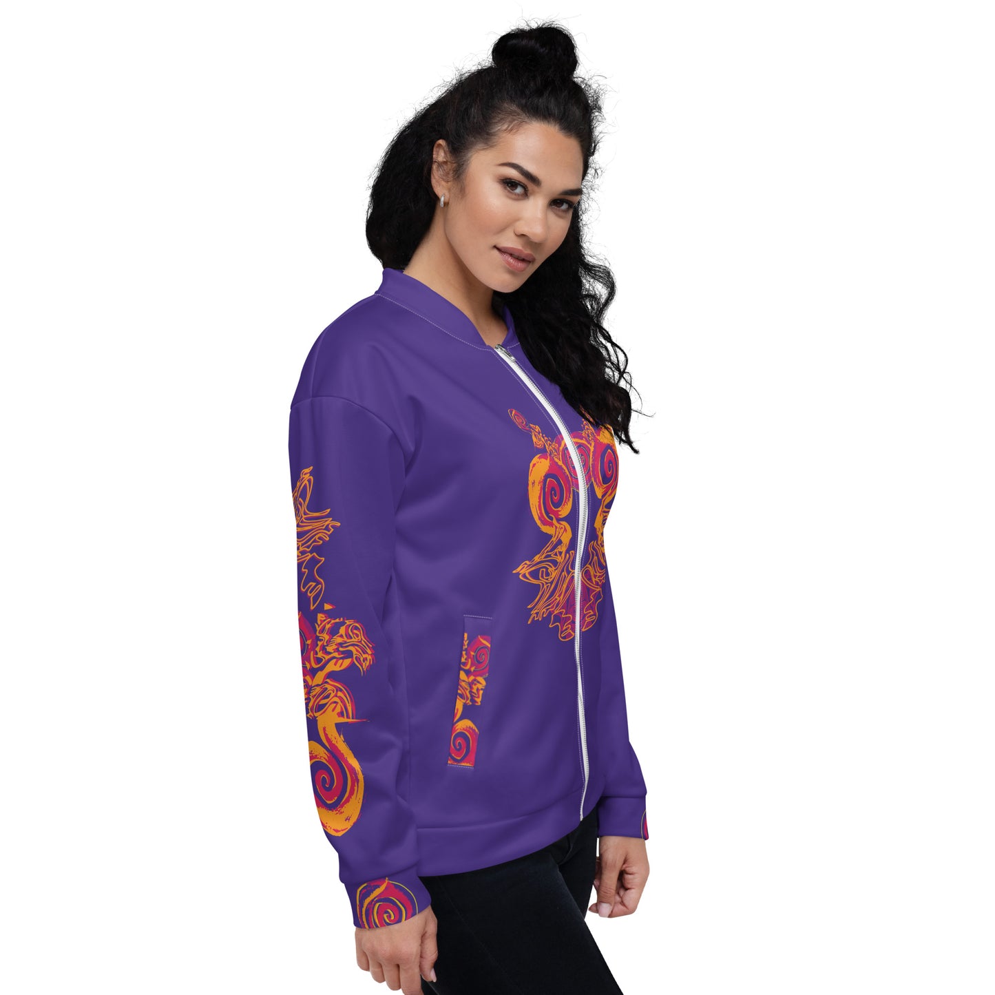 Side view of an old purple bomber jacket with vibrant orange and red culturally inspired patterns, featuring mirrored face design and swirling motifs — expressive fashion from KLOE’s The Secret Chambers of I & I collection, on a model.