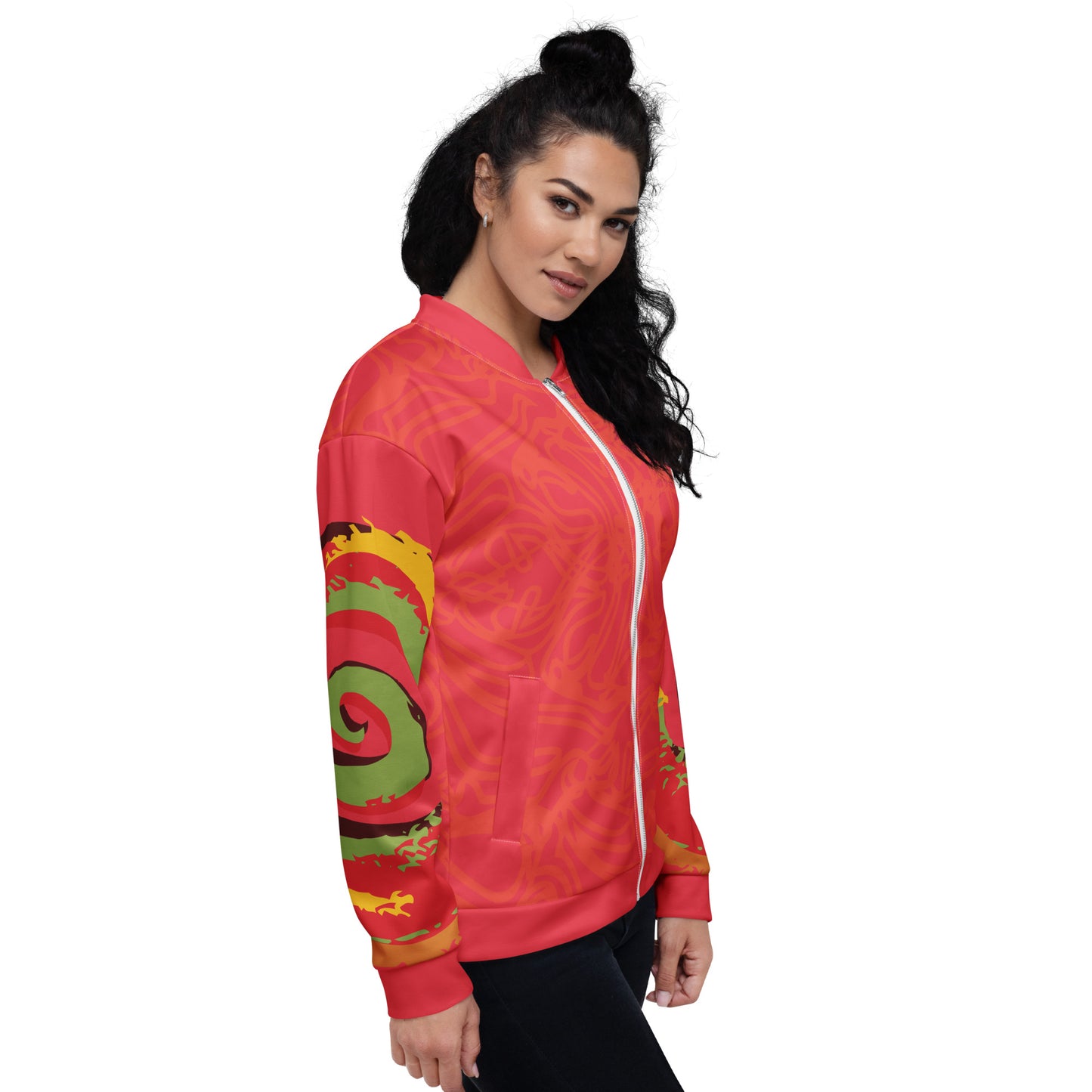 Red bomber jacket with vibrant swirl sleeve details and mirrored face design on the back, inspired by cultural art and bold self-expression.