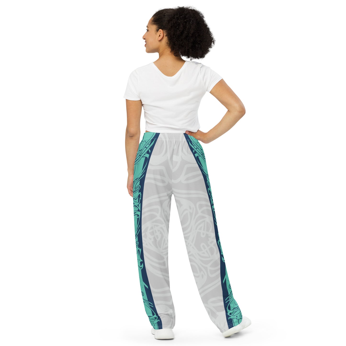 Unisex wide-leg pants with jade and navy abstract print, featuring dynamic spiral patterns and hand-drawn linework for a bold, artistic look.