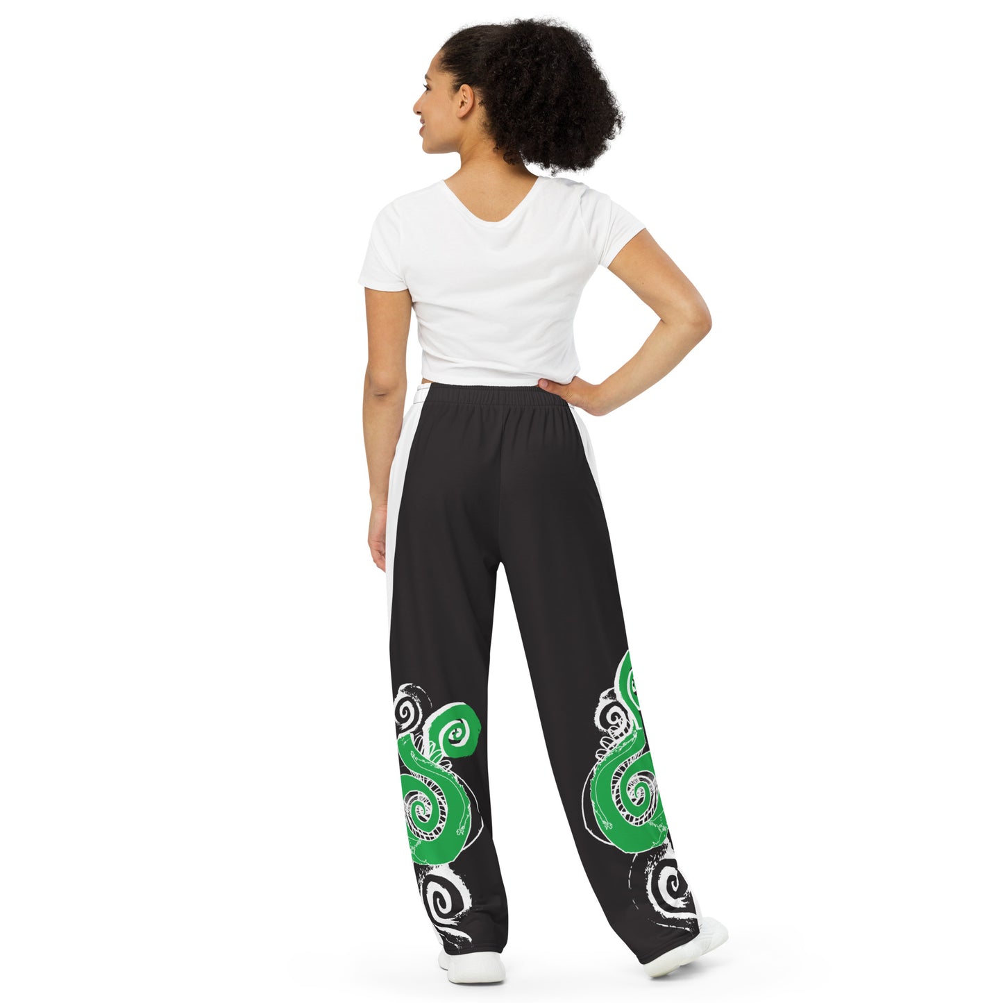 Hand-illustrated unisex wide-leg pants featuring bold green spirals and expressive linework — crafted for standout comfort, movement, and authentic self-expression, exclusive to KLOE.