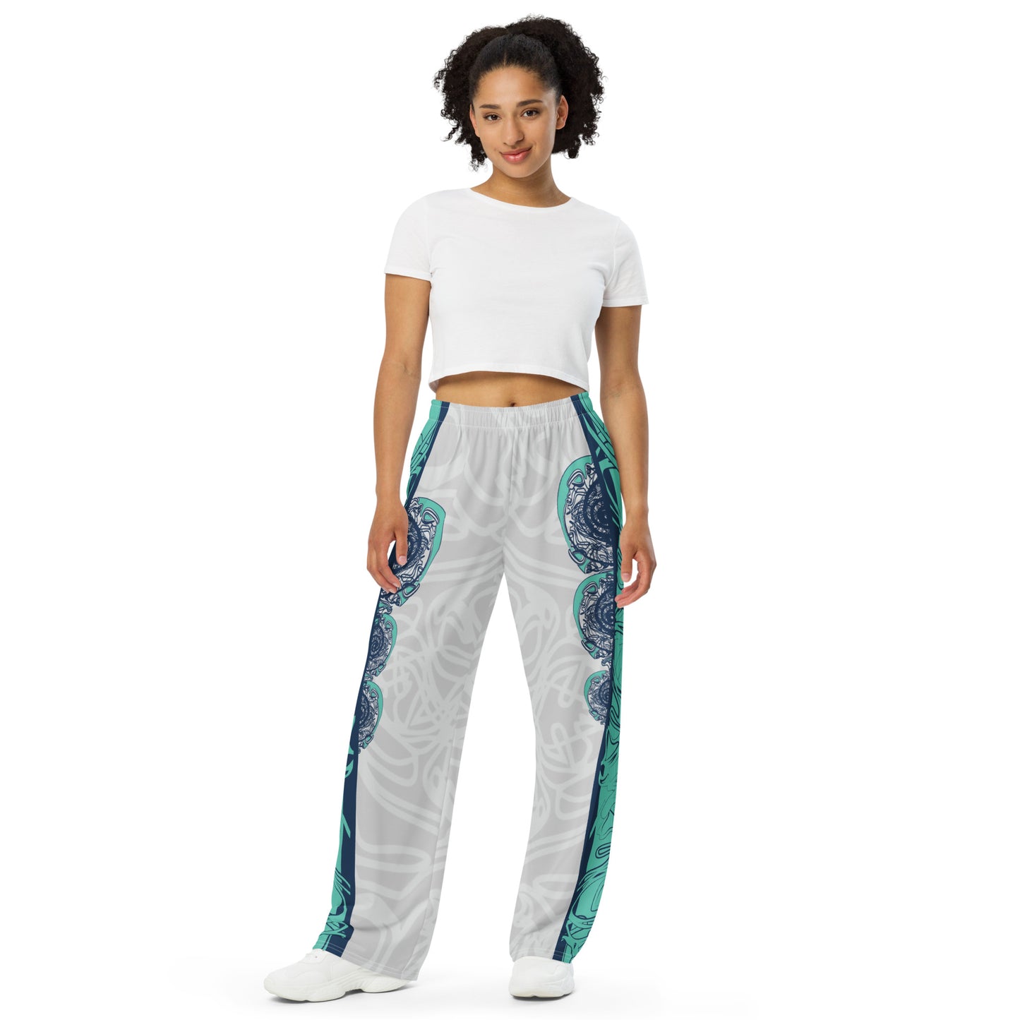 Unisex wide-leg pants with jade and navy abstract print, featuring dynamic spiral patterns and hand-drawn linework for a bold, artistic look.