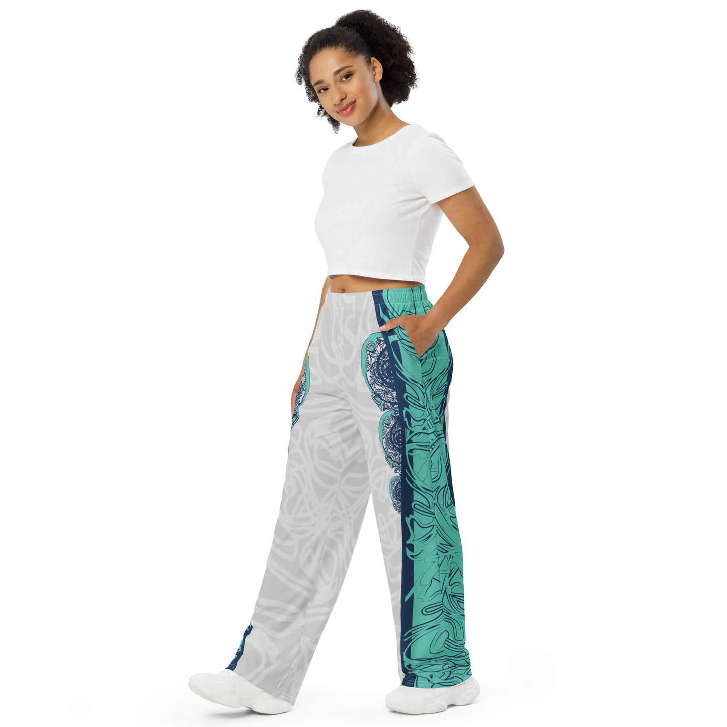 Unisex wide-leg pants with jade and navy abstract print, featuring dynamic spiral patterns and hand-drawn linework for a bold, artistic look.