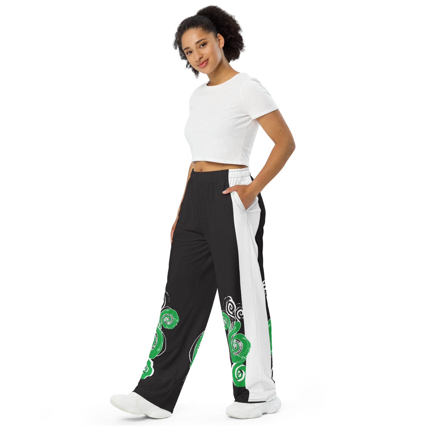 Hand-illustrated unisex wide-leg pants featuring bold green spirals and expressive linework — crafted for standout comfort, movement, and authentic self-expression, exclusive to KLOE.