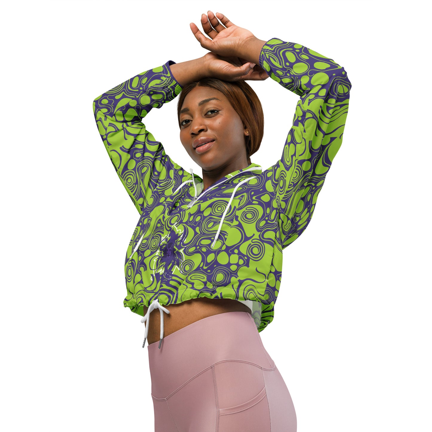 The model wearing green and purple cropped windbreaker from Kloe Store featuring bold abstract patterns and a unique artistic face design, ideal for a trendy streetwear look.