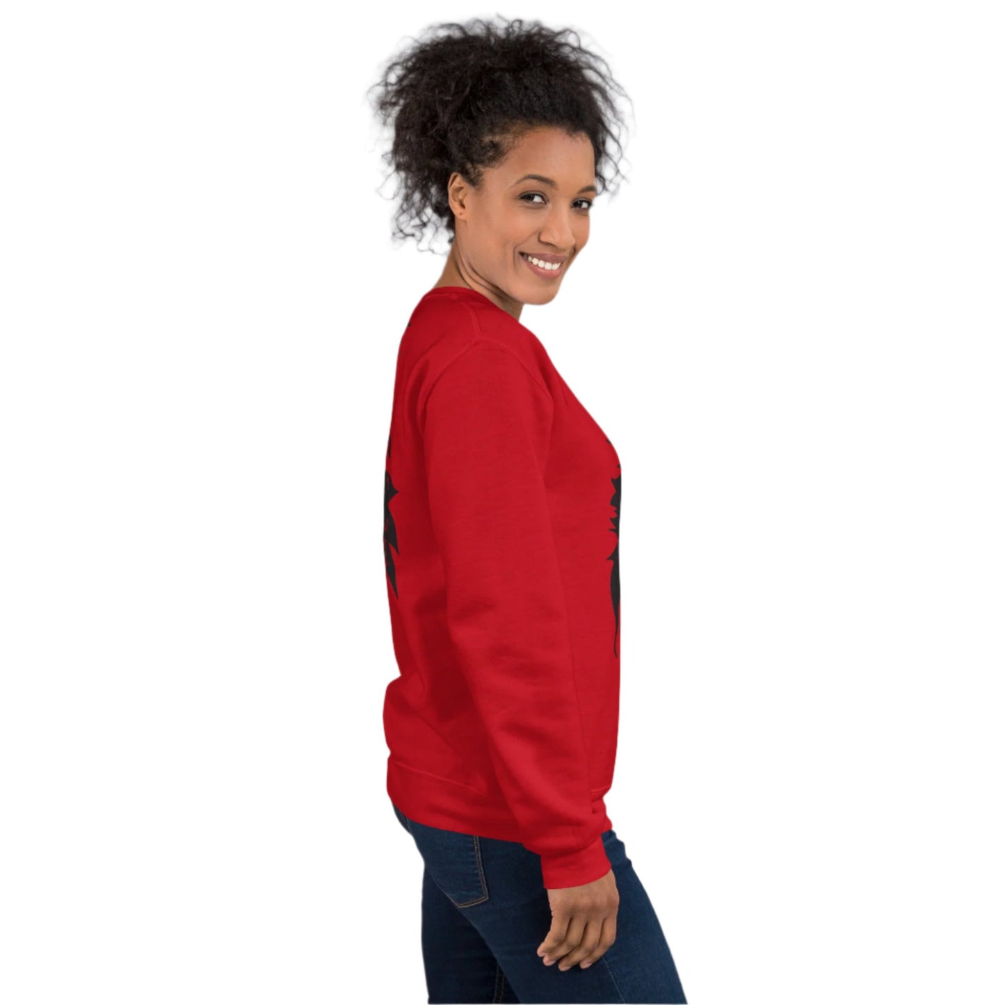 A model wearing red K.L.O.E. sweatshirt featuring a culturally inspired, hand-drawn black graphic of a bold, expressive face surrounded by intricate details, celebrating individuality and artistic self-expression in modern bohemian style fashion.