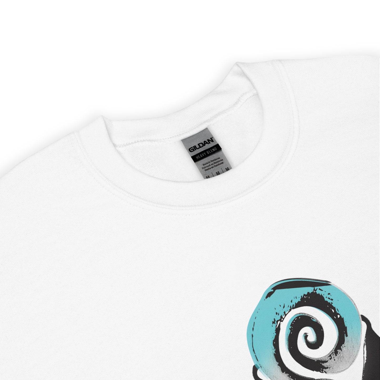 The detail view of the white K.L.O.E. sweatshirt with a culturally inspired, hand-drawn design of two mirrored faces in bold black and teal, celebrating self-expression and individuality in modern bohemian style clothing.