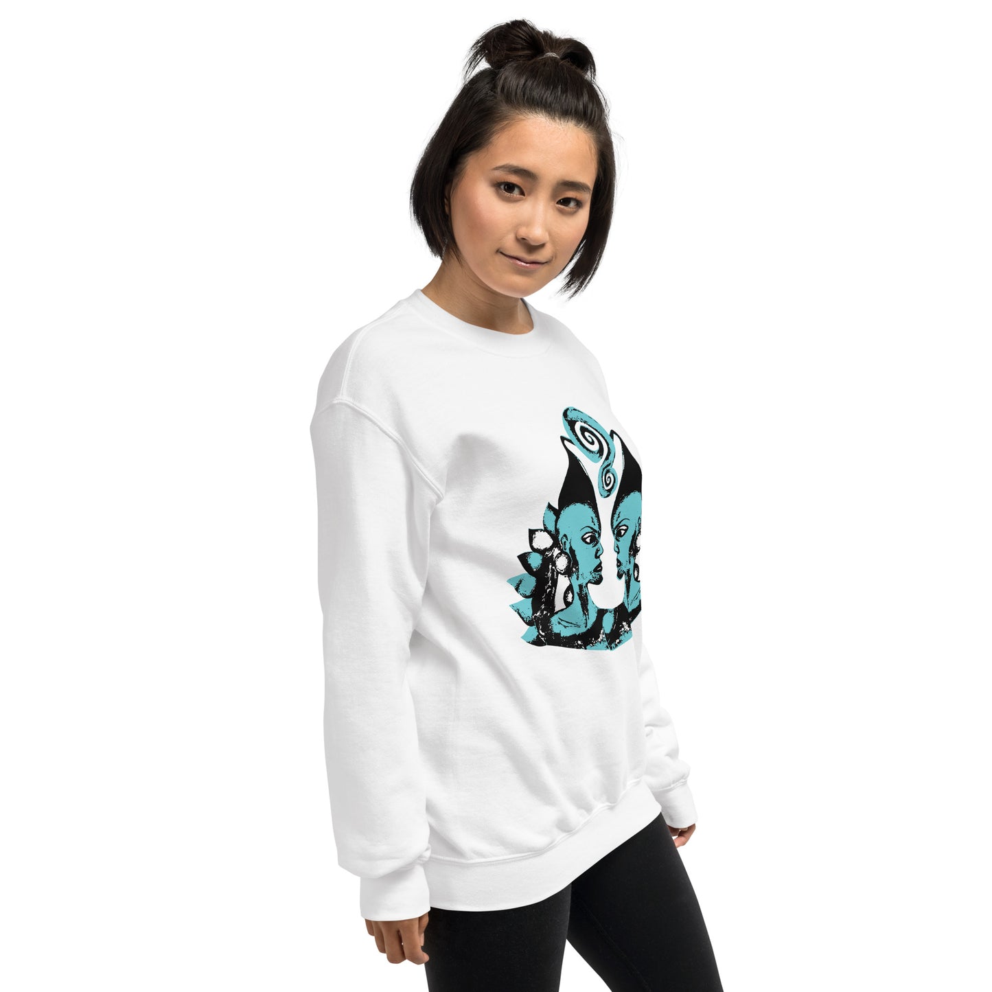 A model wearing the white K.L.O.E. sweatshirt featuring a hand-drawn design of two mirrored faces in bold black and teal, showcasing cultural inspiration, individuality, and modern bohemian style self-expression.