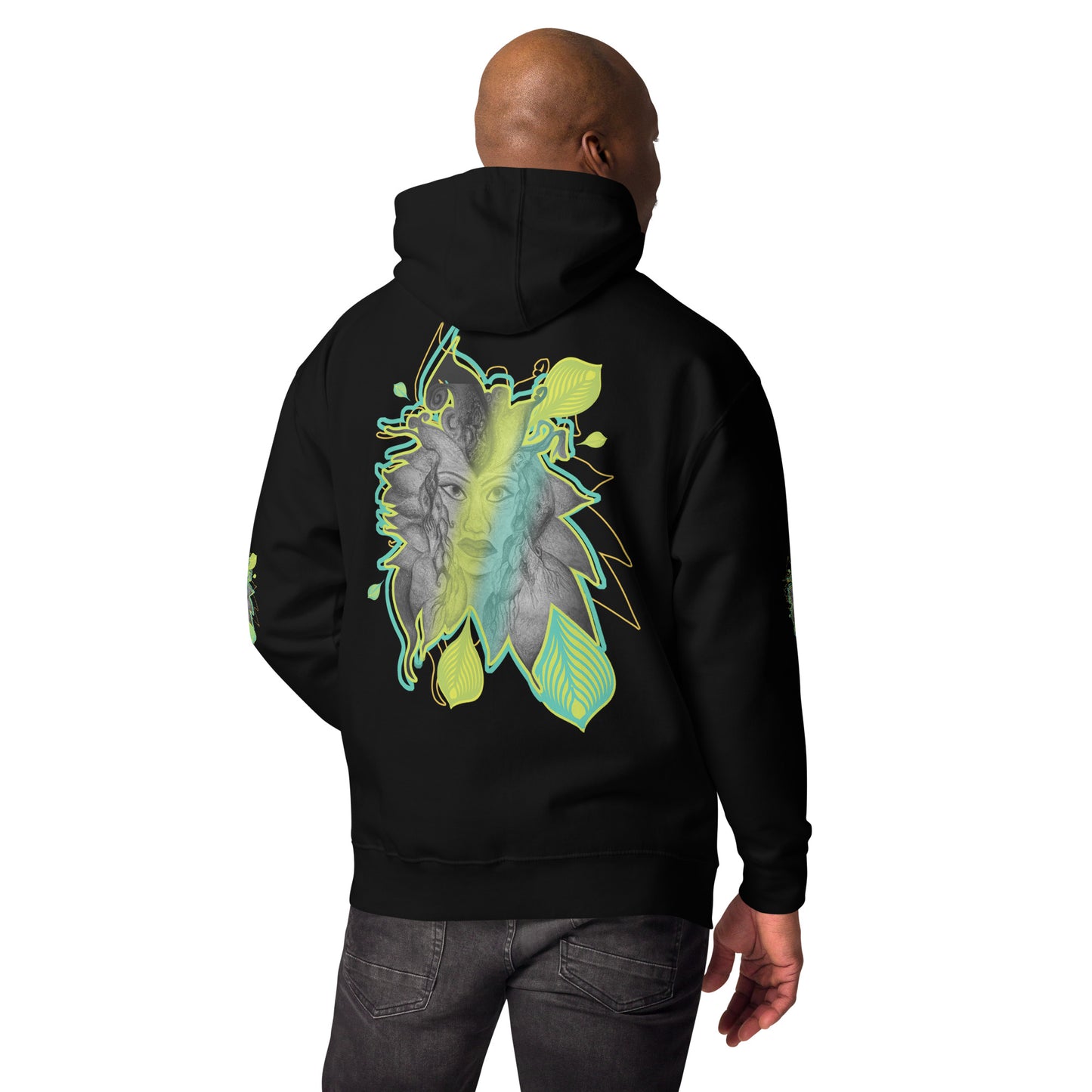 Back view of K.L.O.E. black hoodie featuring a bold hand-drawn face design framed by vibrant green and yellow leaf patterns. A statement of modern bohemian style, artistic craftsmanship, and self-expression that celebrates individuality and culturally inspired fashion, on a model.