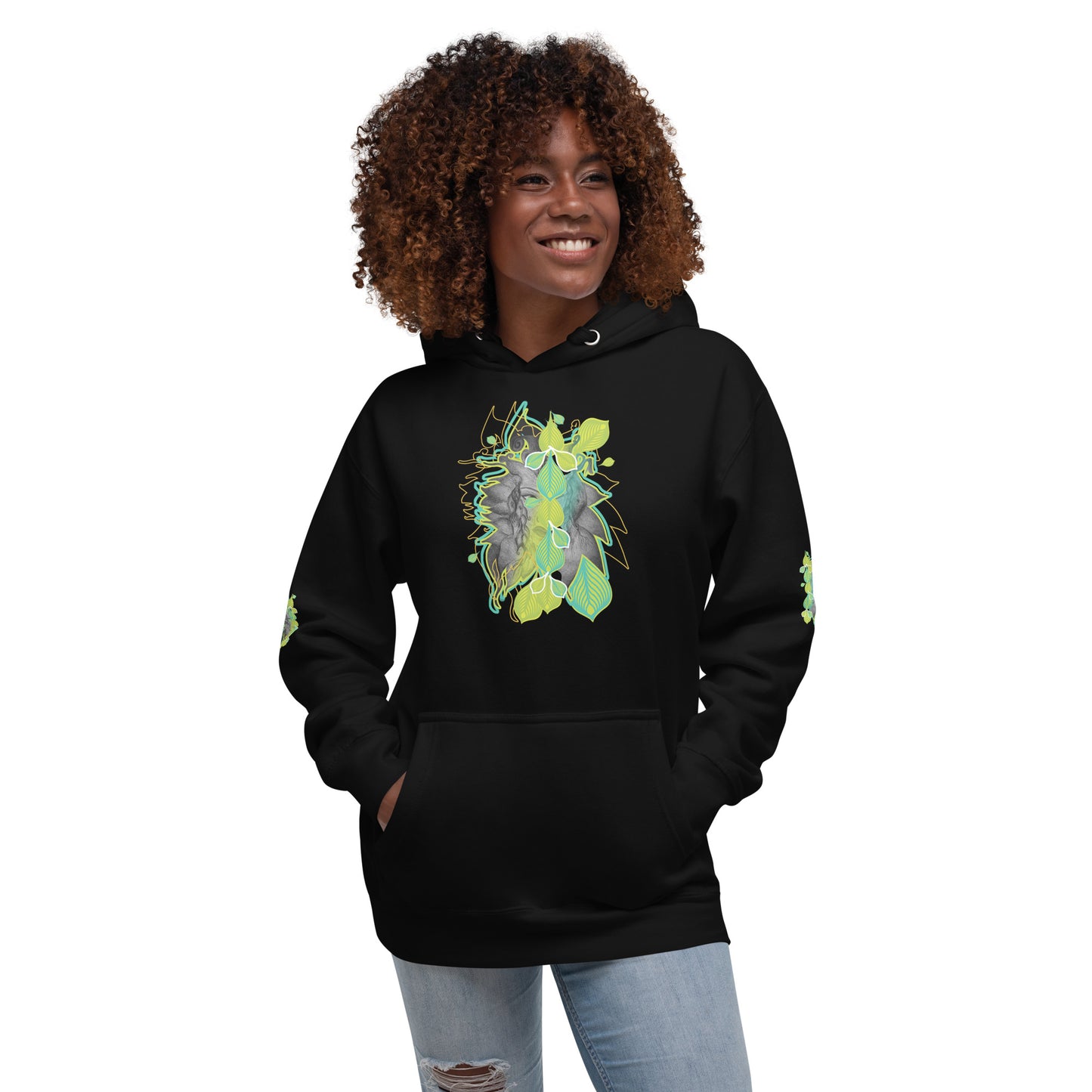 Front view of black K.L.O.E. hoodie with vibrant green and yellow leaf patterns framing a detailed hand-drawn face design. A modern bohemian style statement that celebrates individuality, artistic expression, and culturally inspired fashion,on a model.