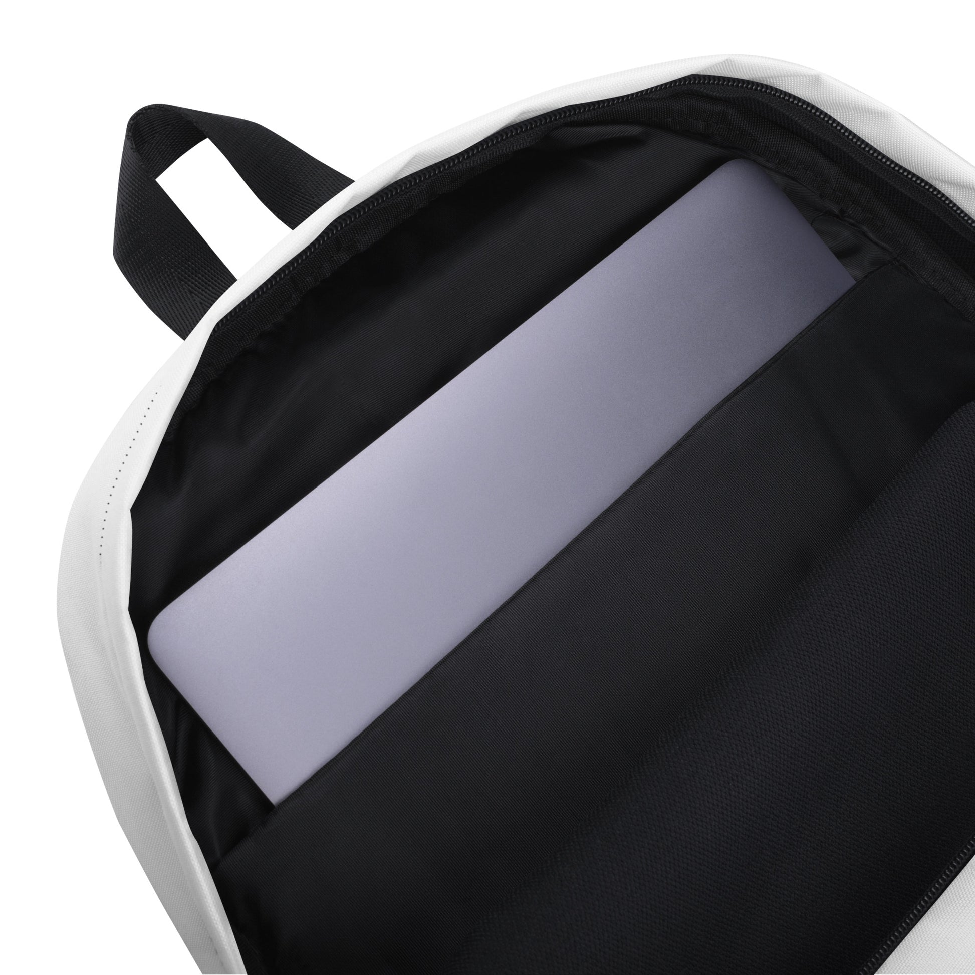 The inside pocket of the white backpack, featuring a hand-drawn, culturally inspired design of two mirrored faces in bold black and teal on the main panel, and an intricate teal spiral motif on the pocket, celebrating self-expression and individuality in modern bohemian style fashion by K.L.O.E.