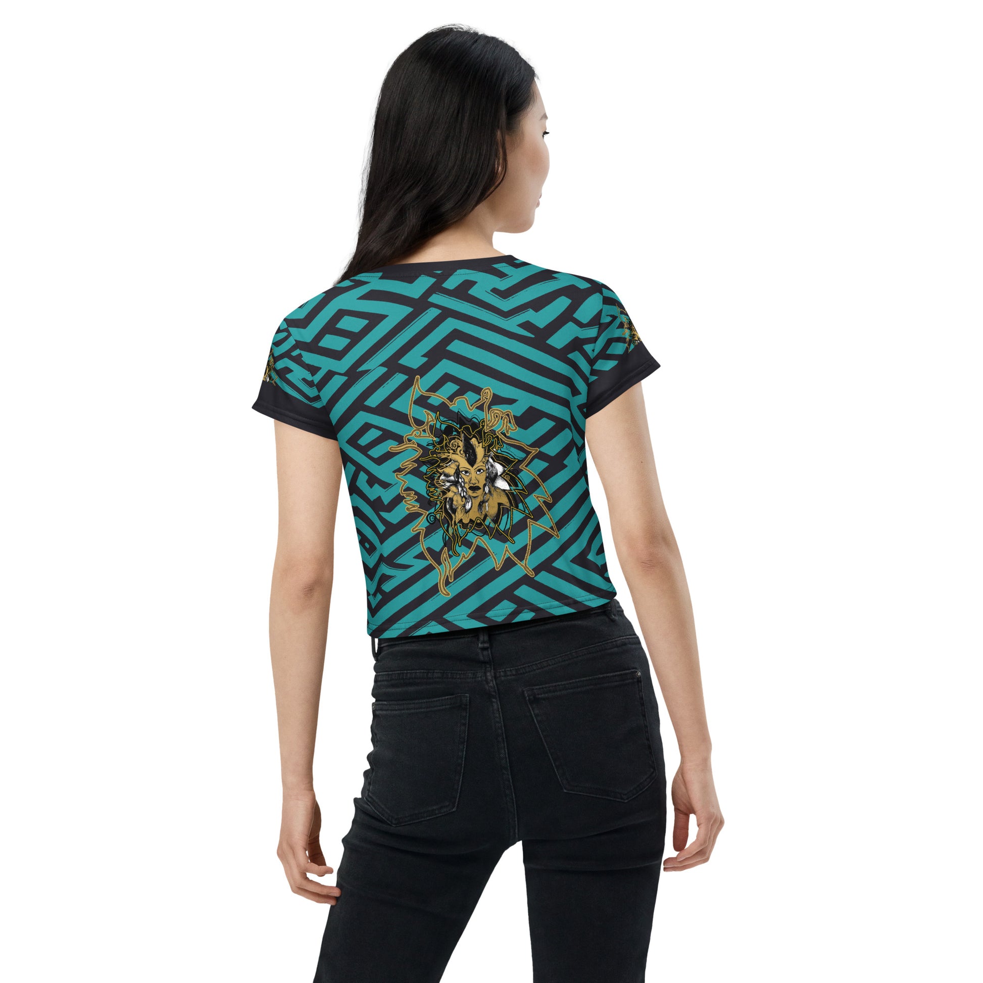 Back view of a vibrant blue and black geometric patterned crop top with a bold graphic centerpiece, perfect for streetwear fashion.