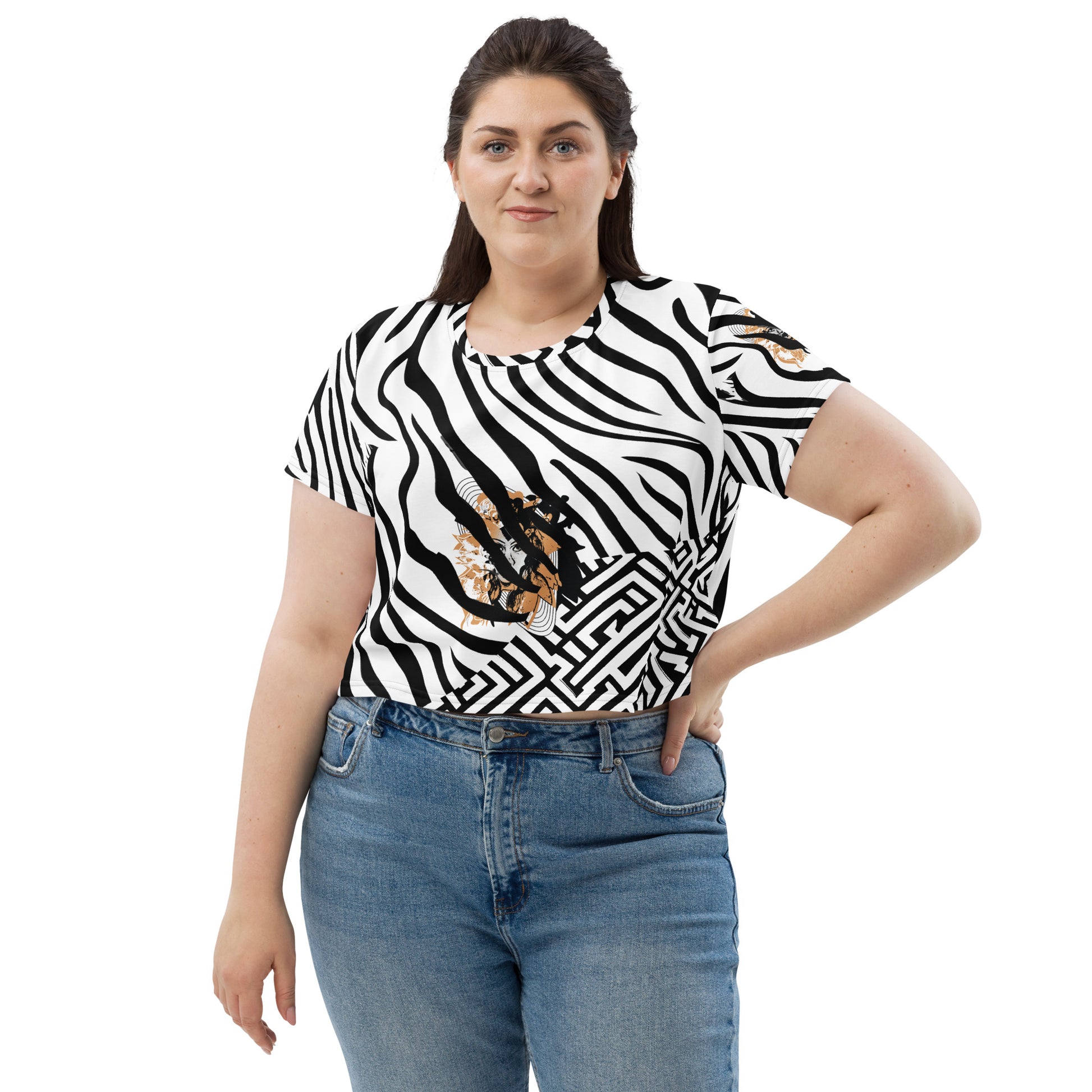 Plus size model wearing black and white zebra print crop tee from Kloe Store featuring a bold artistic face design in the center, showcasing unique and edgy streetwear fashion.