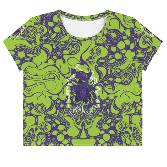 Green and purple crop tee from Kloe Store featuring bold abstract patterns and a unique central artistic face design, perfect for a trendy and edgy streetwear style.