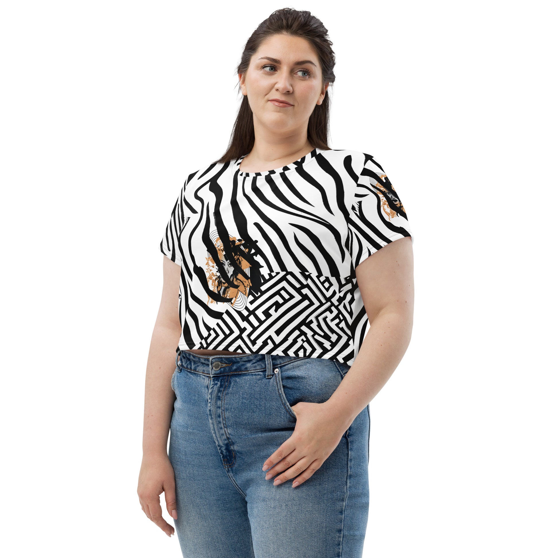 Plus size model wearing black and white zebra print crop tee from Kloe Store featuring a bold artistic face design in the center, showcasing unique and edgy streetwear fashion.