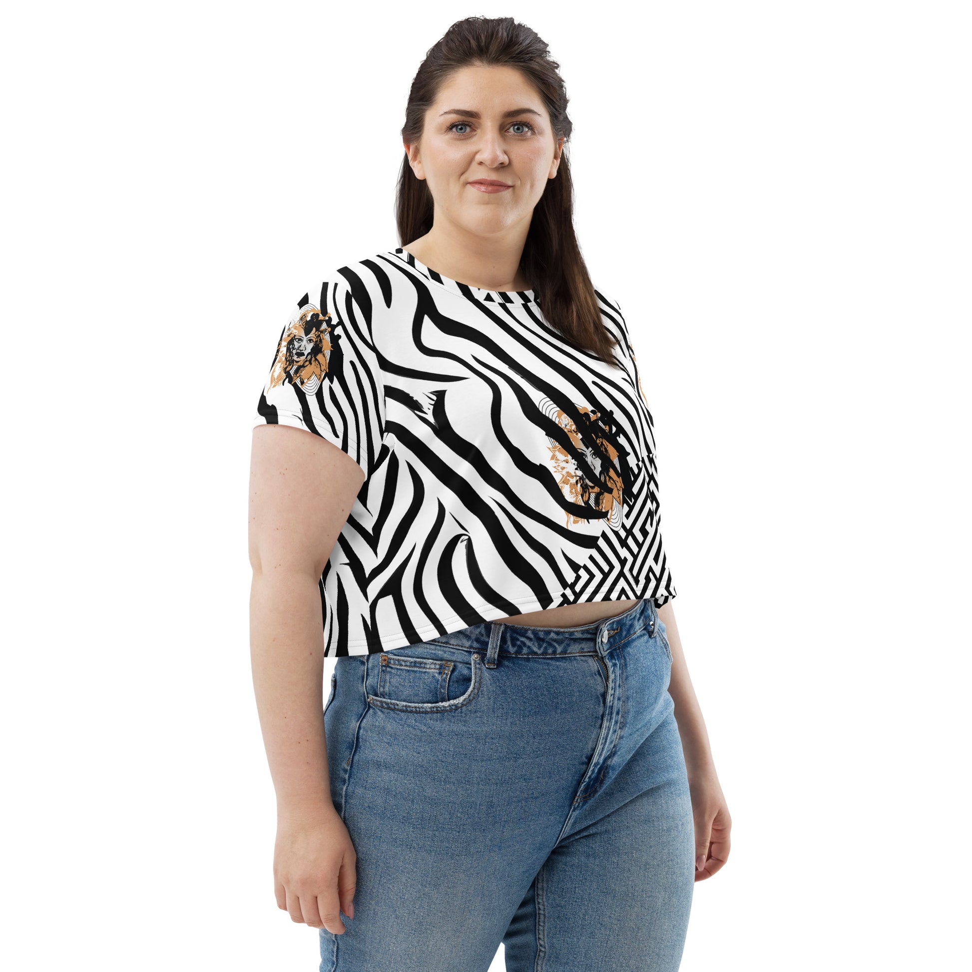 Plus size model wearing black and white zebra print crop tee from Kloe Store featuring a bold artistic face design in the center, showcasing unique and edgy streetwear fashion.