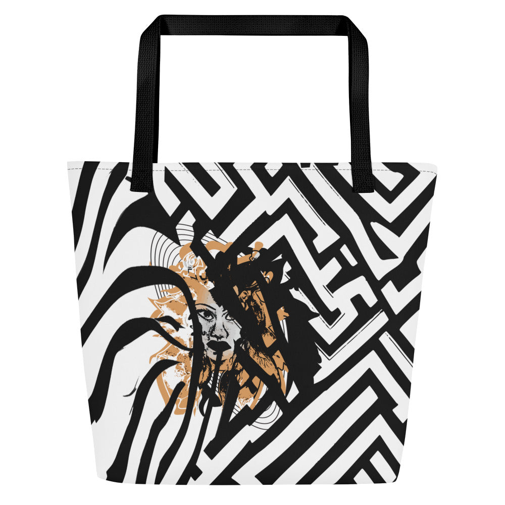 Large black and white tote bag from Kloe Store featuring bold geometric and zebra patterns with an artistic face design and with black straps, stylish and functional for everyday use.
