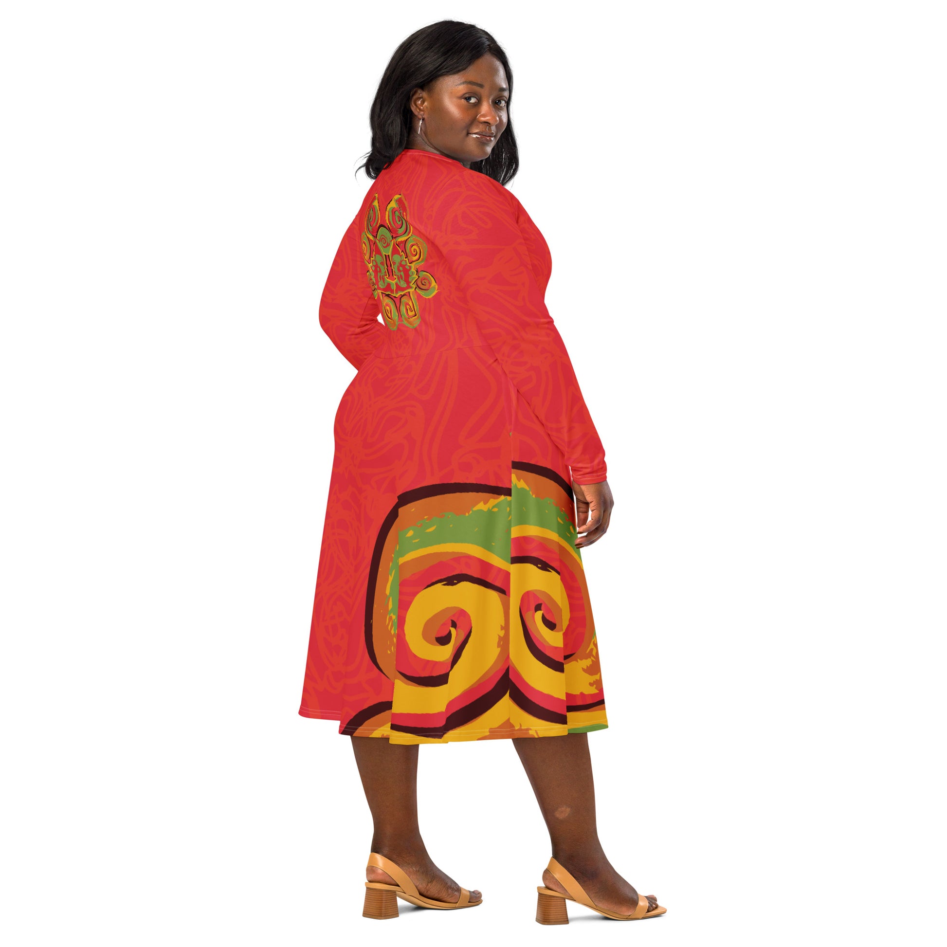 Red dress with vibrant swirl  details and mirrored face design on the back, inspired by cultural art and bold self-expression.