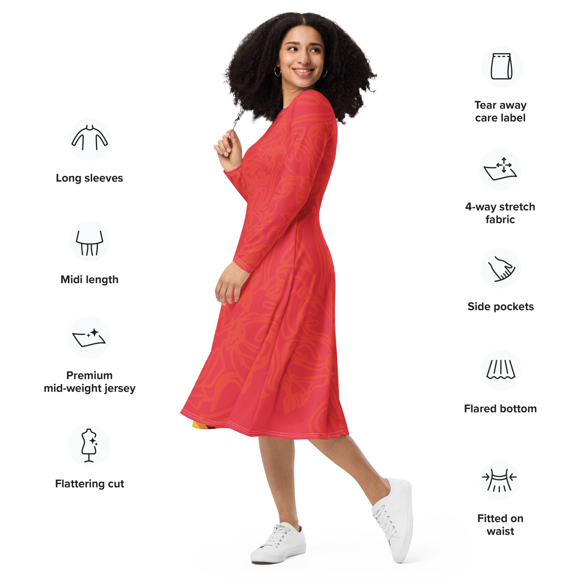 Red dress with vibrant swirl  details and mirrored face design on the back, inspired by cultural art and bold self-expression.