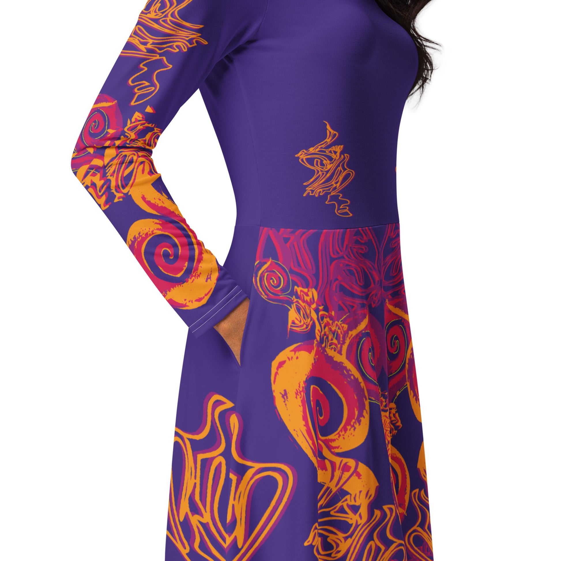 Bold purple long sleeve dress with vibrant orange and red culturally inspired patterns, featuring mirrored face design and swirling motifs — expressive fashion from KLOE’s The Secret Chambers of I & I collection, on a model.