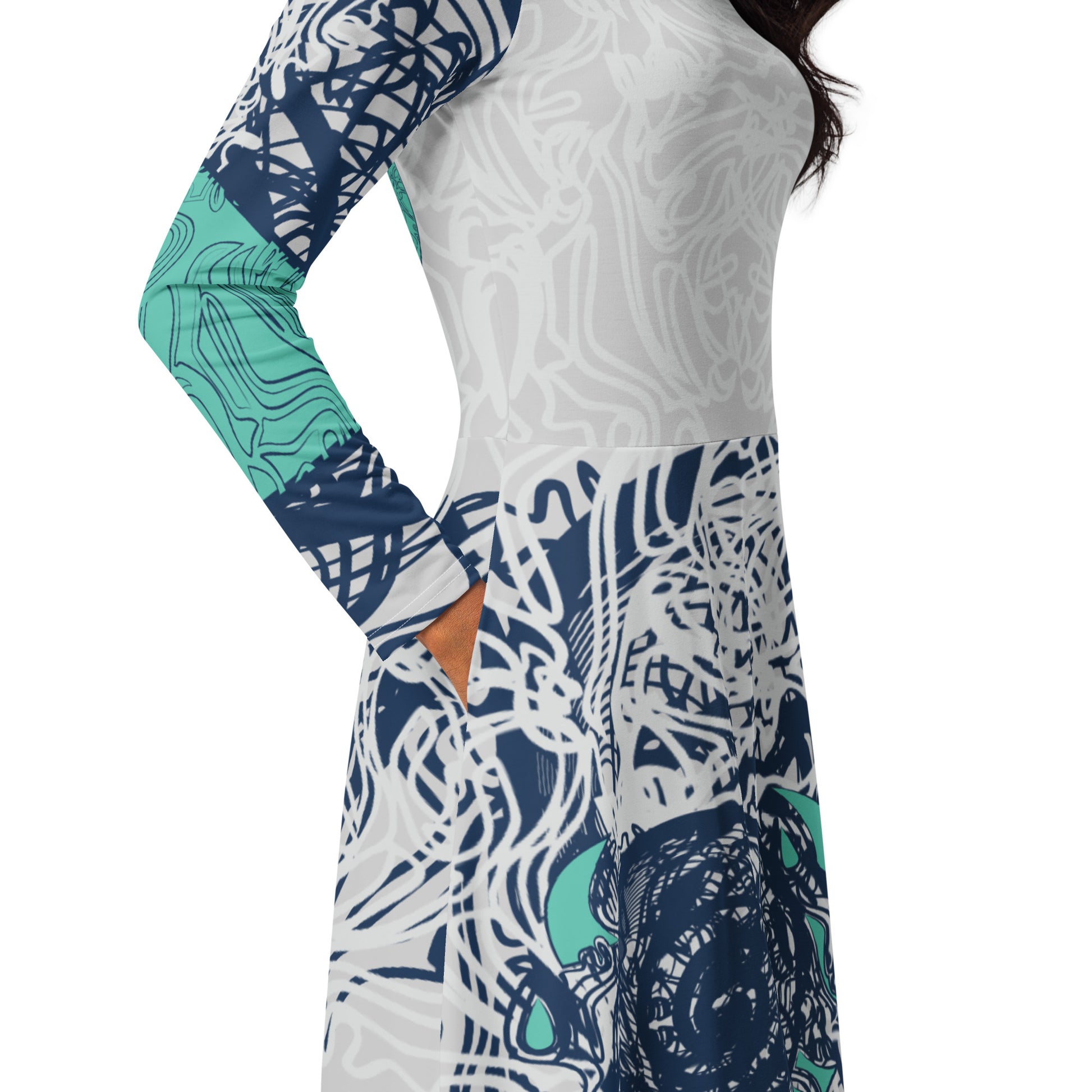 Long sleeve midi dress with full-body abstract print in navy and jade, featuring hand-drawn mirrored faces and layered spiral motifs—designed to express standout individuality.