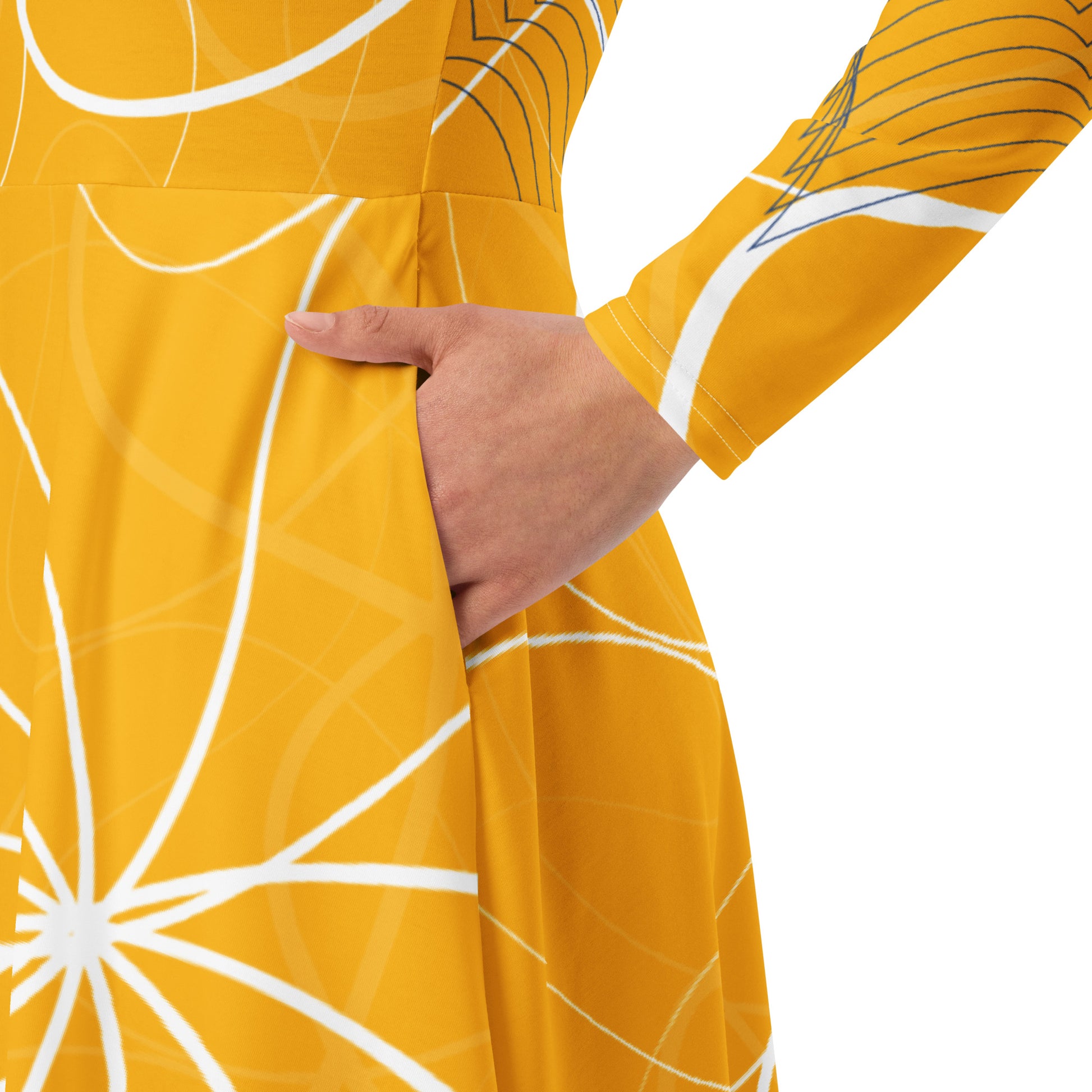 Front view of a golden yellow long sleeve midi dress featuring white swirling line art and navy geometric accents, blending flowing streetwear design with expressive hand-drawn patterns.