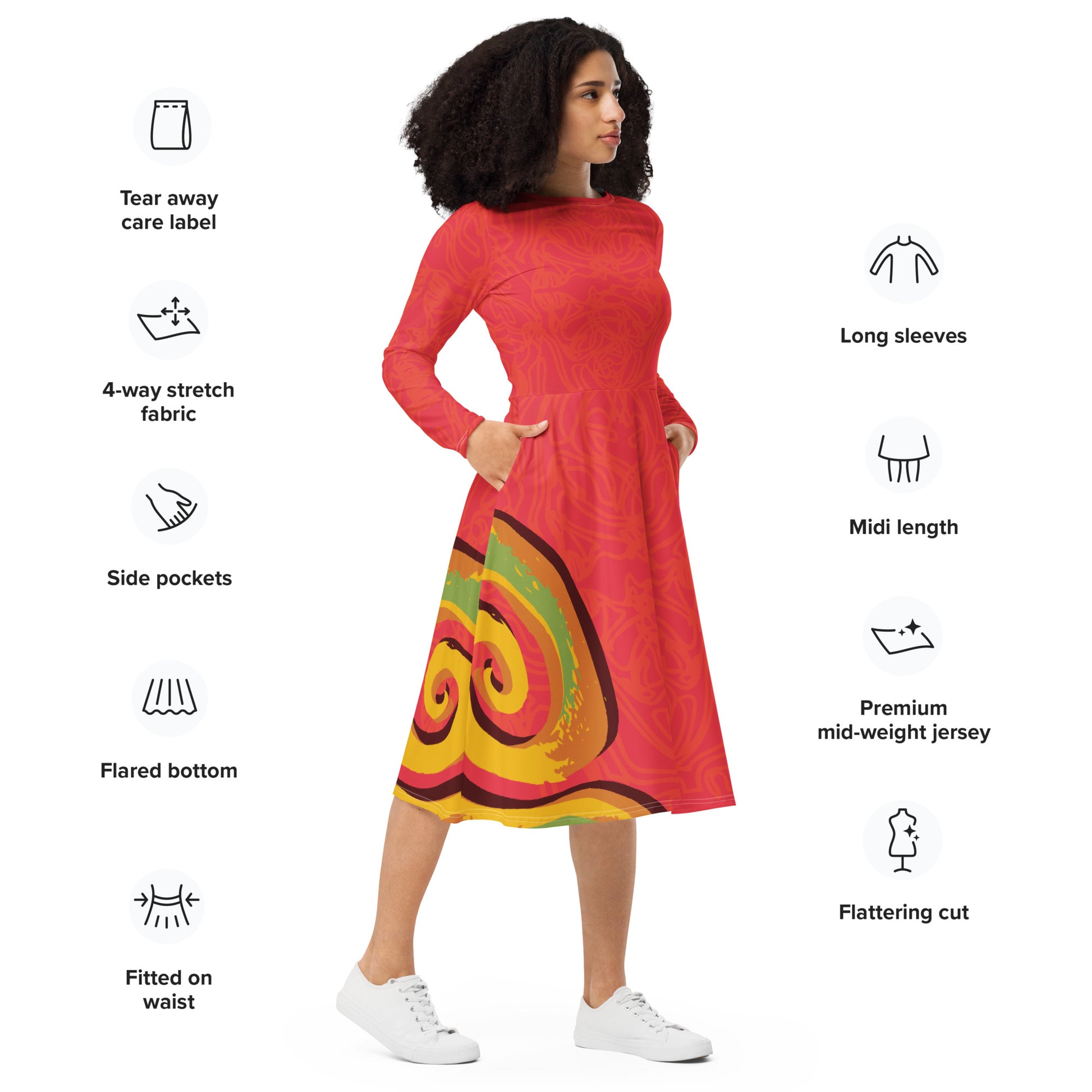 Red dress with vibrant swirl  details and mirrored face design on the back, inspired by cultural art and bold self-expression.