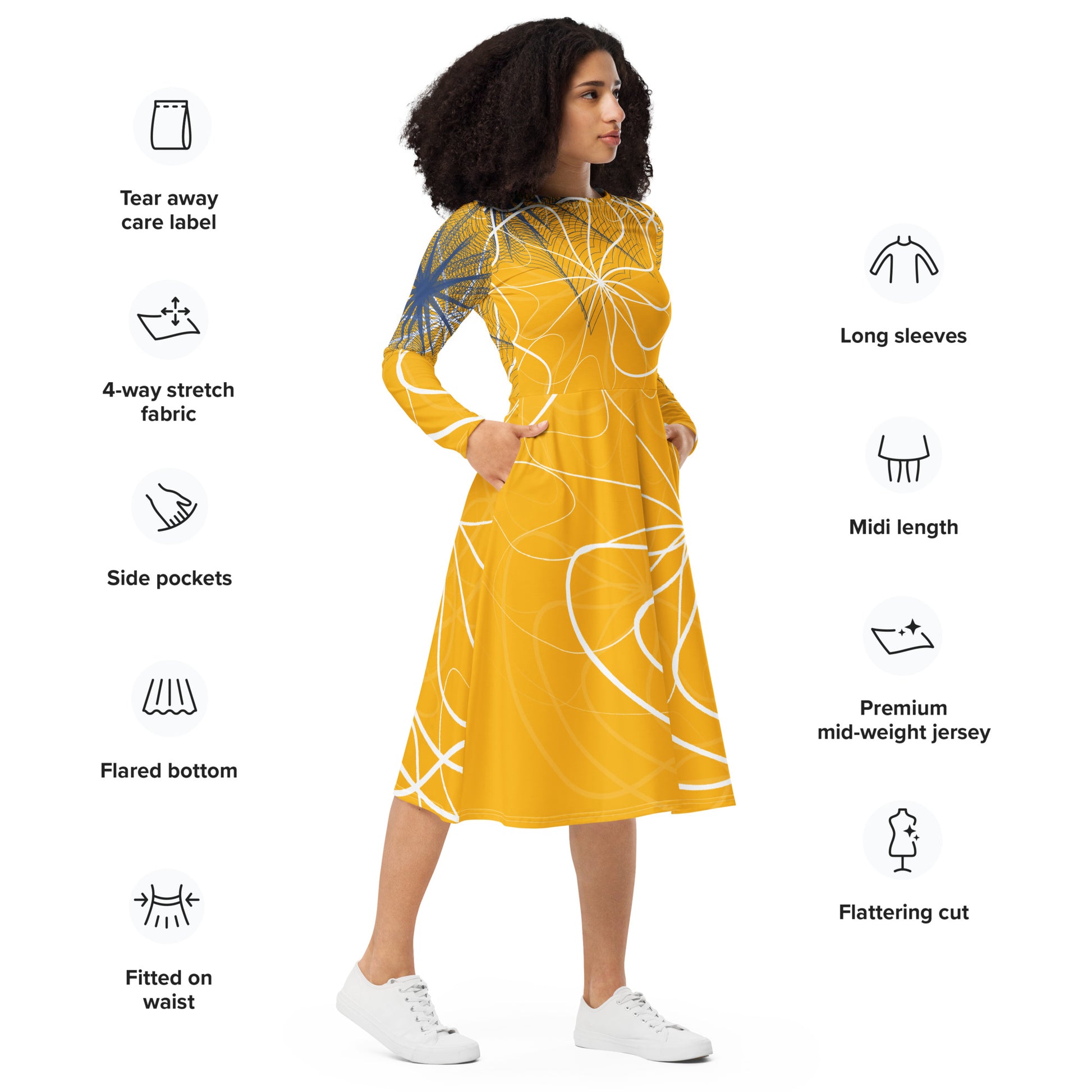 Front view of a golden yellow long sleeve midi dress featuring white swirling line art and navy geometric accents, blending flowing streetwear design with expressive hand-drawn patterns, with product details.