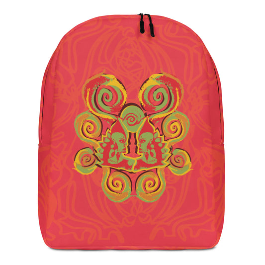 Red-orange backpack with mirrored face design and vibrant spiral patterns, inspired by cultural artistry and self-expression.