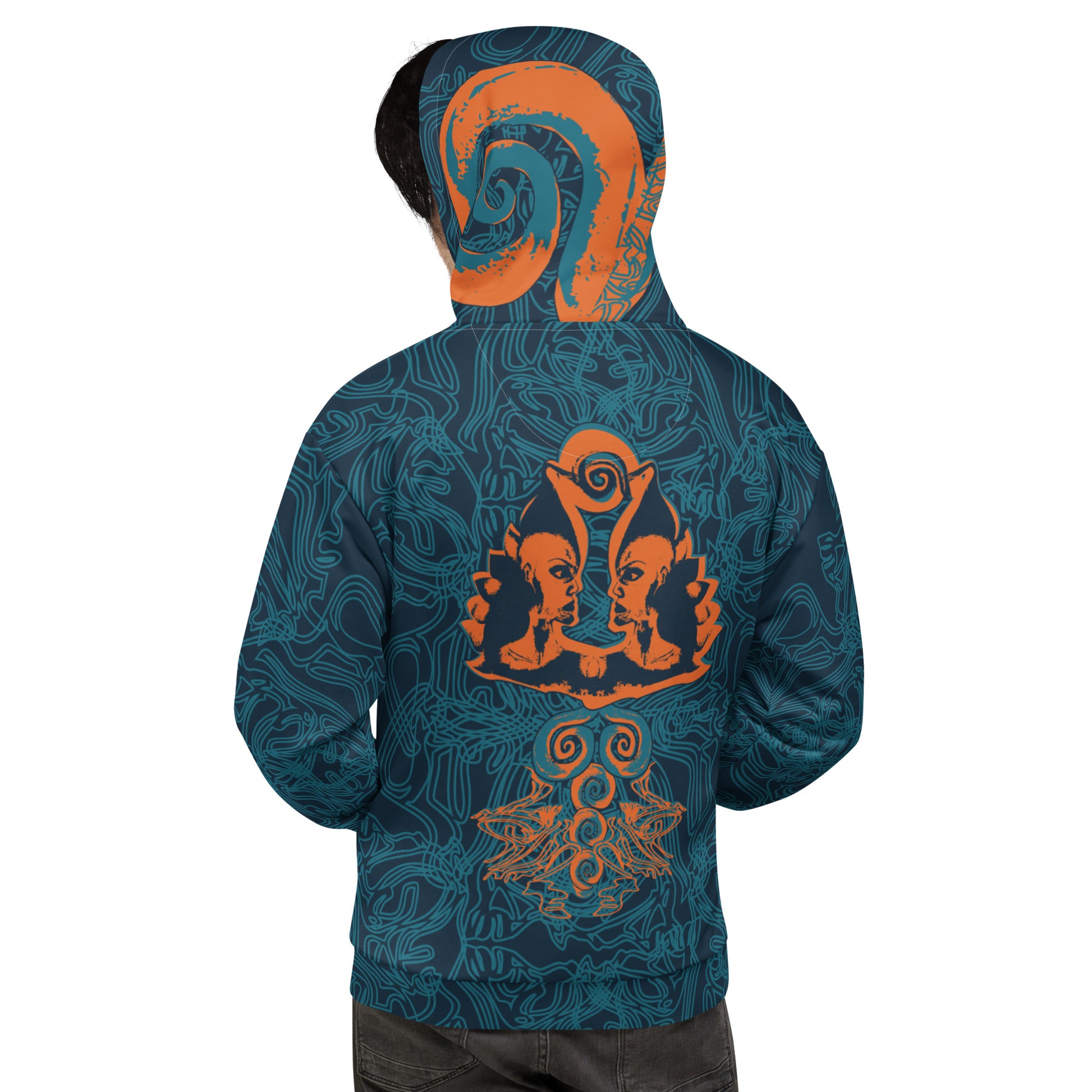 Back view of a navy blue hoodie featuring intricate cyan patterns and bold orange mirrored faces, with a tribal-inspired design on the hood.