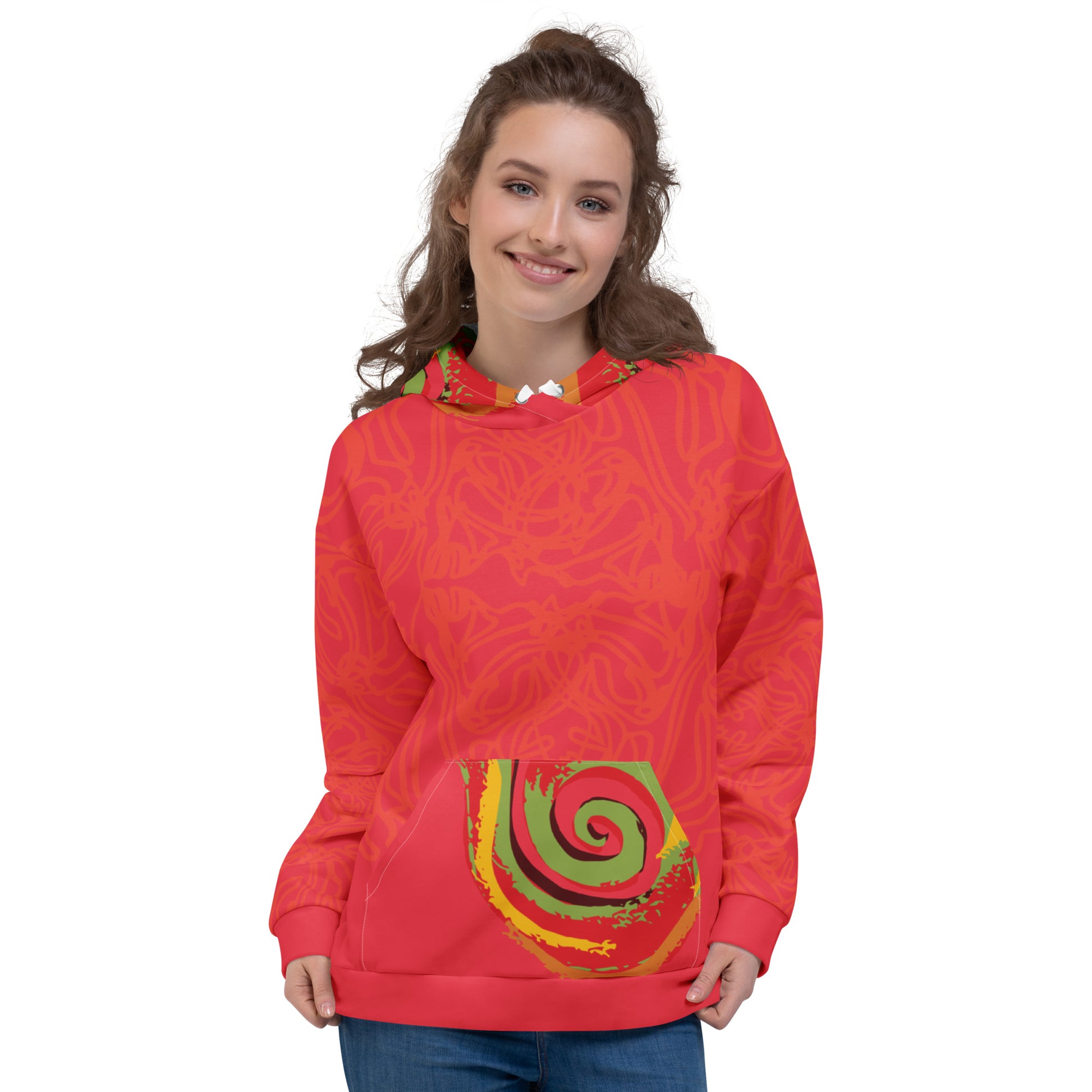Red hoodie with bold spiral pocket design and mirrored face artwork on the back, inspired by cultural art and self-expression.