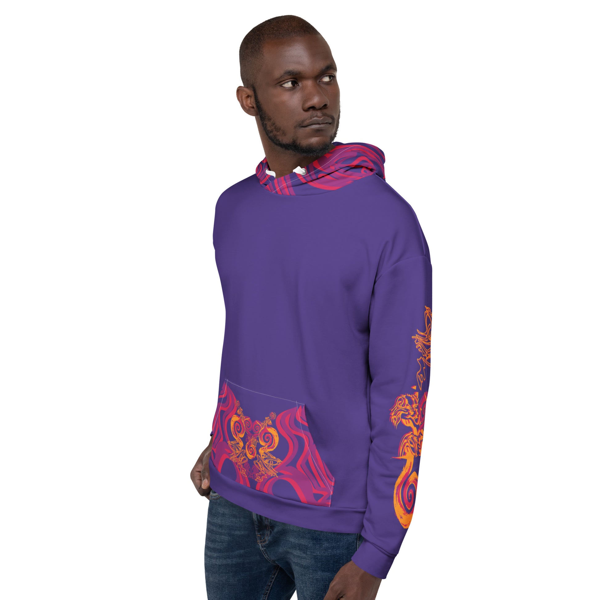 A model wearing a vibrant purple hoodie with bold orange and red culturally inspired patterns, mirrored face design, and abstract swirls — expressive fashion from KLOE’s The Secret Chambers of I & I collection.