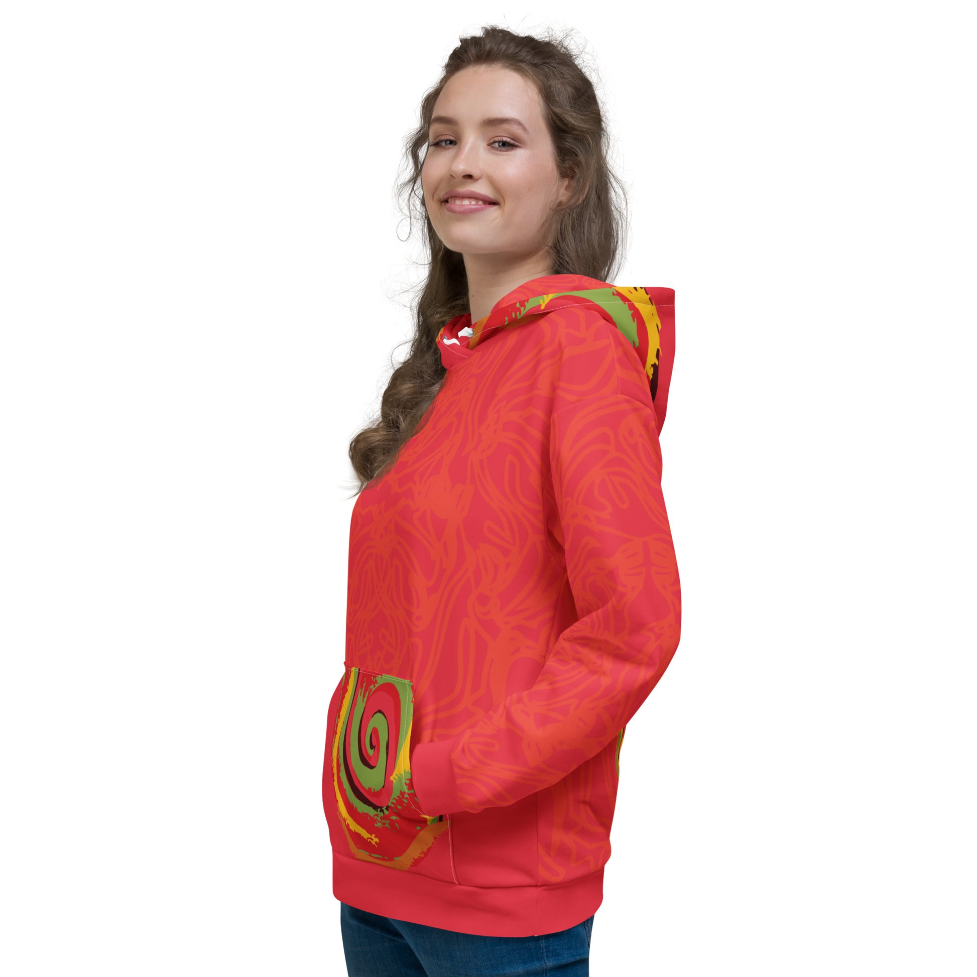 Red hoodie with bold spiral pocket design and mirrored face artwork on the back, inspired by cultural art and self-expression.