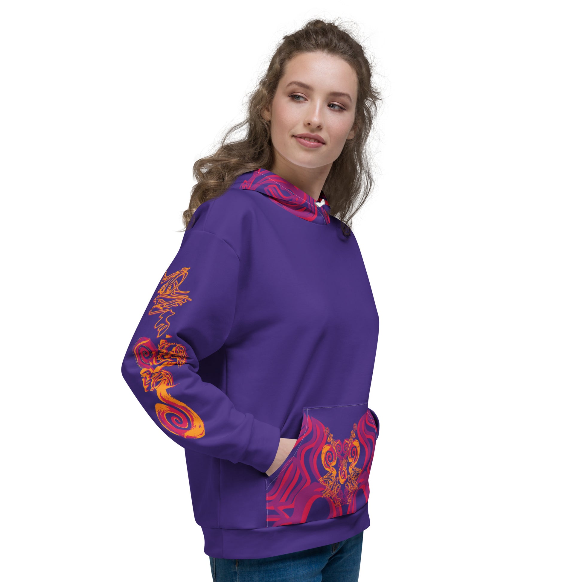 Vibrant purple hoodie with bold orange and red culturally inspired patterns, mirrored face design, and abstract swirls — expressive fashion from KLOE’s The Secret Chambers of I & I collection, on a model.