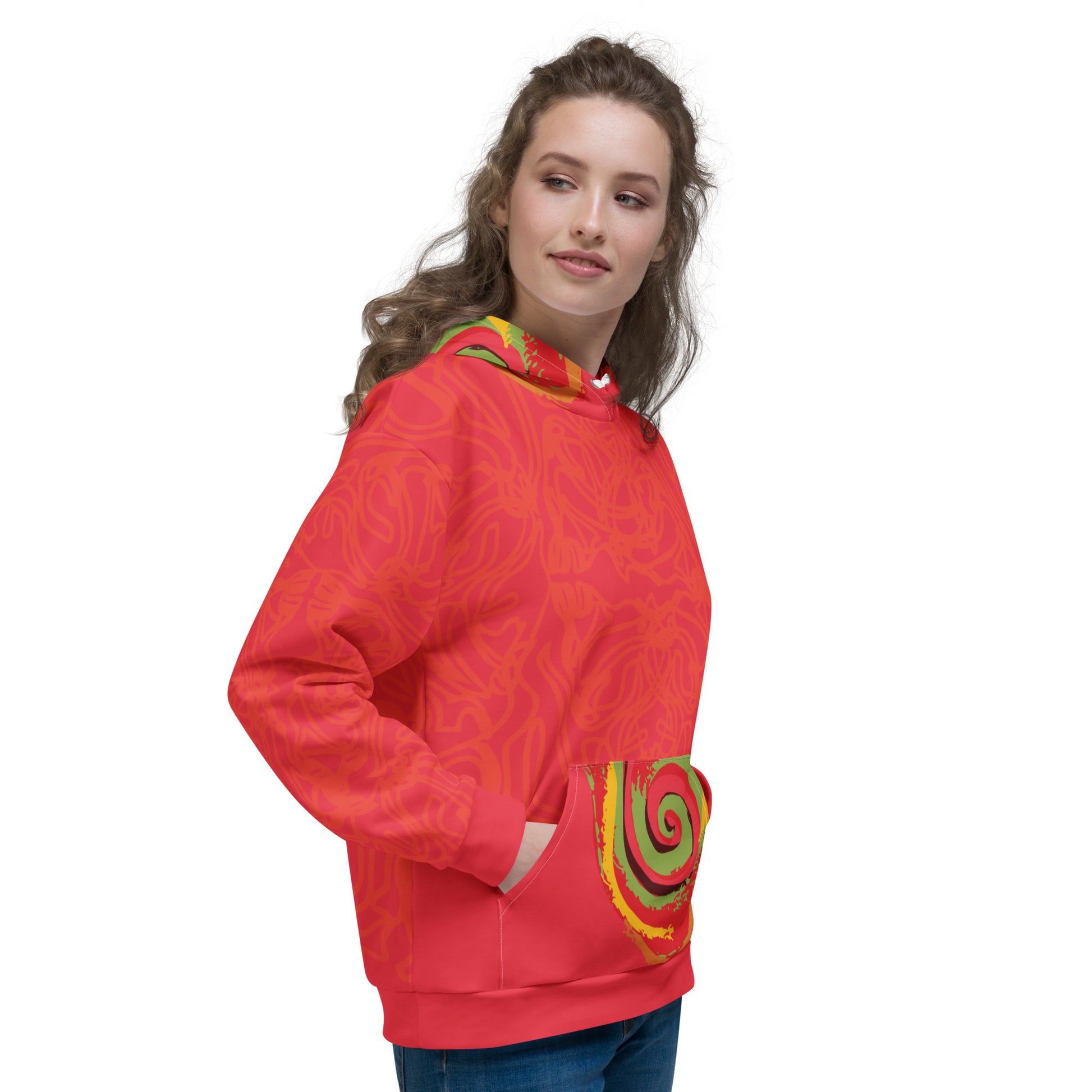 Red hoodie with bold spiral pocket design and mirrored face artwork on the back, inspired by cultural art and self-expression.