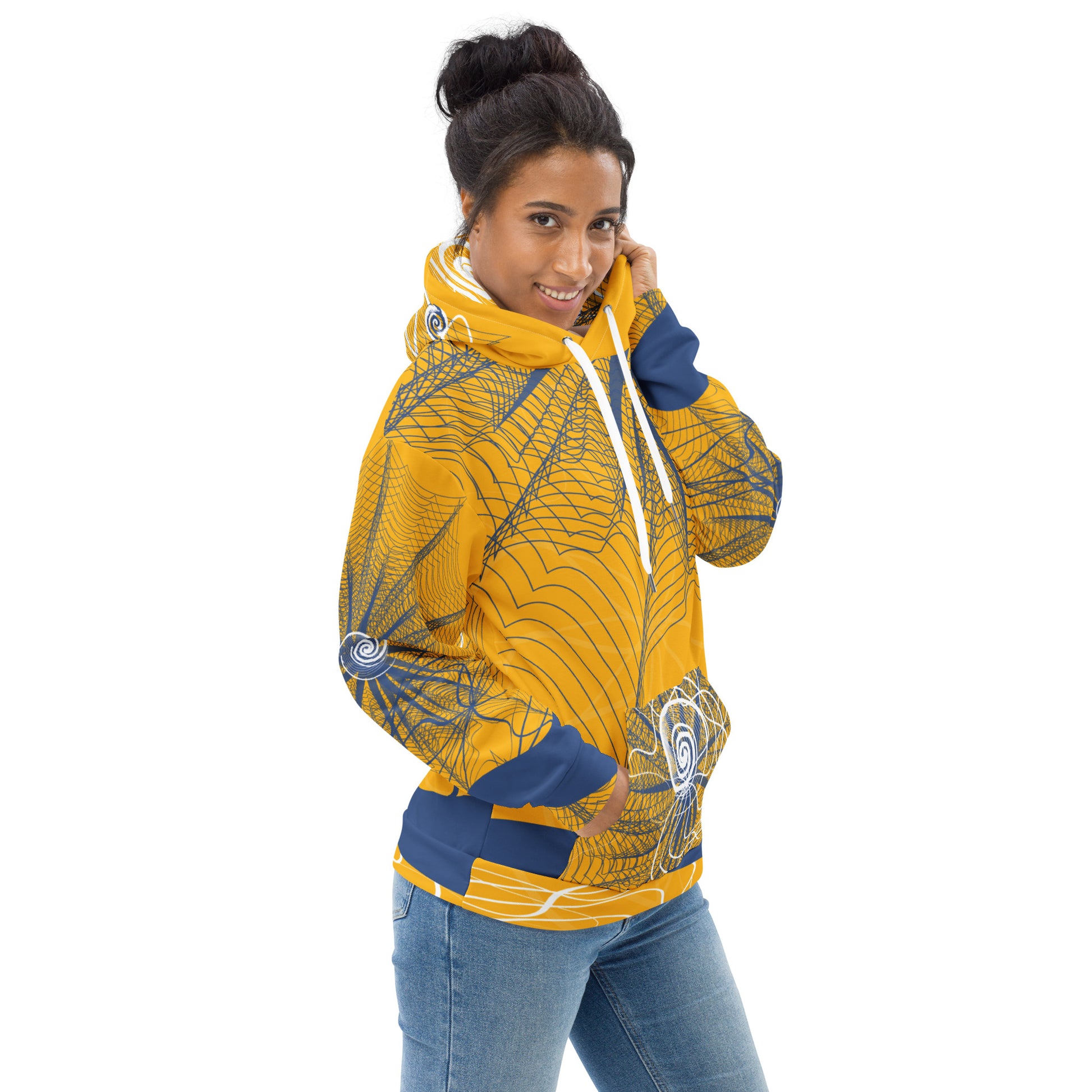 Side view of a golden yellow hoodie featuring navy web-like patterns, white spiral graphics, and a front pocket—blending bold streetwear with hand-drawn artistic detail.