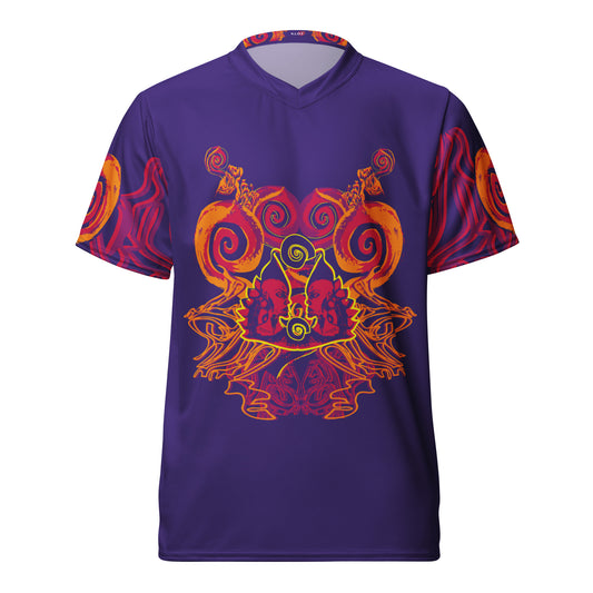 Vibrant purple sports jersey with bold orange and red culturally inspired patterns, featuring mirrored faces and swirling designs – expressive fashion from KLOE’s The Secret Chambers of I & I collection.